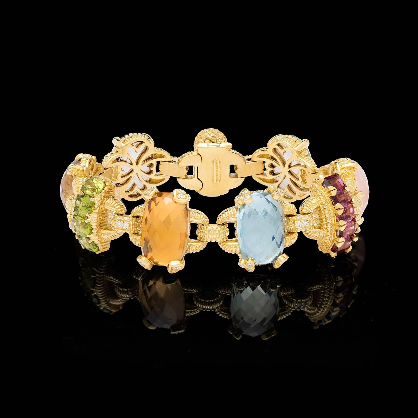 Judith Ripka 18k yellow gold Ambrosia collection bracelet features amethyst, citrine, peridot, pink tourmaline, rose quartz, tsavorite, and prasiolite gems. Detailed with Judith Ripka's signature textured gold finish and diamonds set in the prongs.