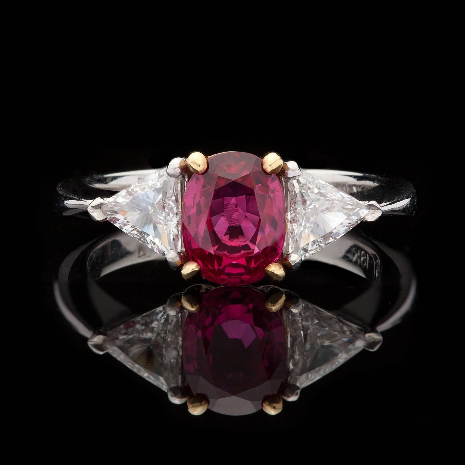 Contemporary Oval Ruby, Diamond, Platinum and Yellow Gold Ring