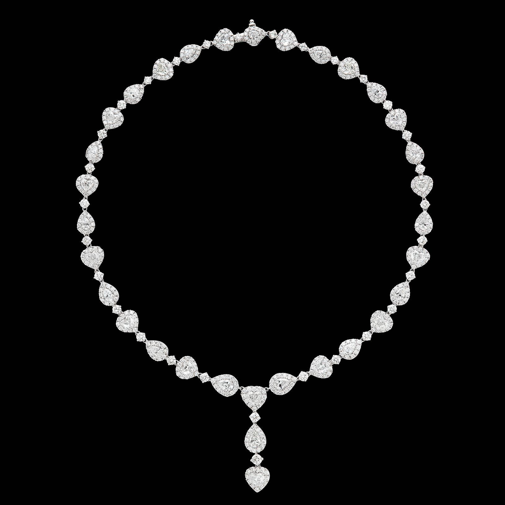 This exquisite estate necklace features an impressive combination of Heart, Pear Shape and Round Brilliant Cut Diamonds for a total diamond weight of approximately 45 carats. Beautifully set in Platinum, each fancy cut diamond is set perfectly