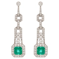 Superbes boucles d'oreilles en émeraudes et diamants de style Art déco