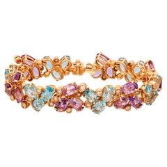 Bracciale italiano con più gemme e oro rosa 18k