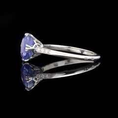 2.09 Carat Natural Purplish-Blue Oval Sapphire in French Platinum Mounting