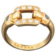 Elegant Cartier Ring Crafted in 18K Yellow Gold with Sapphires and Diamonds