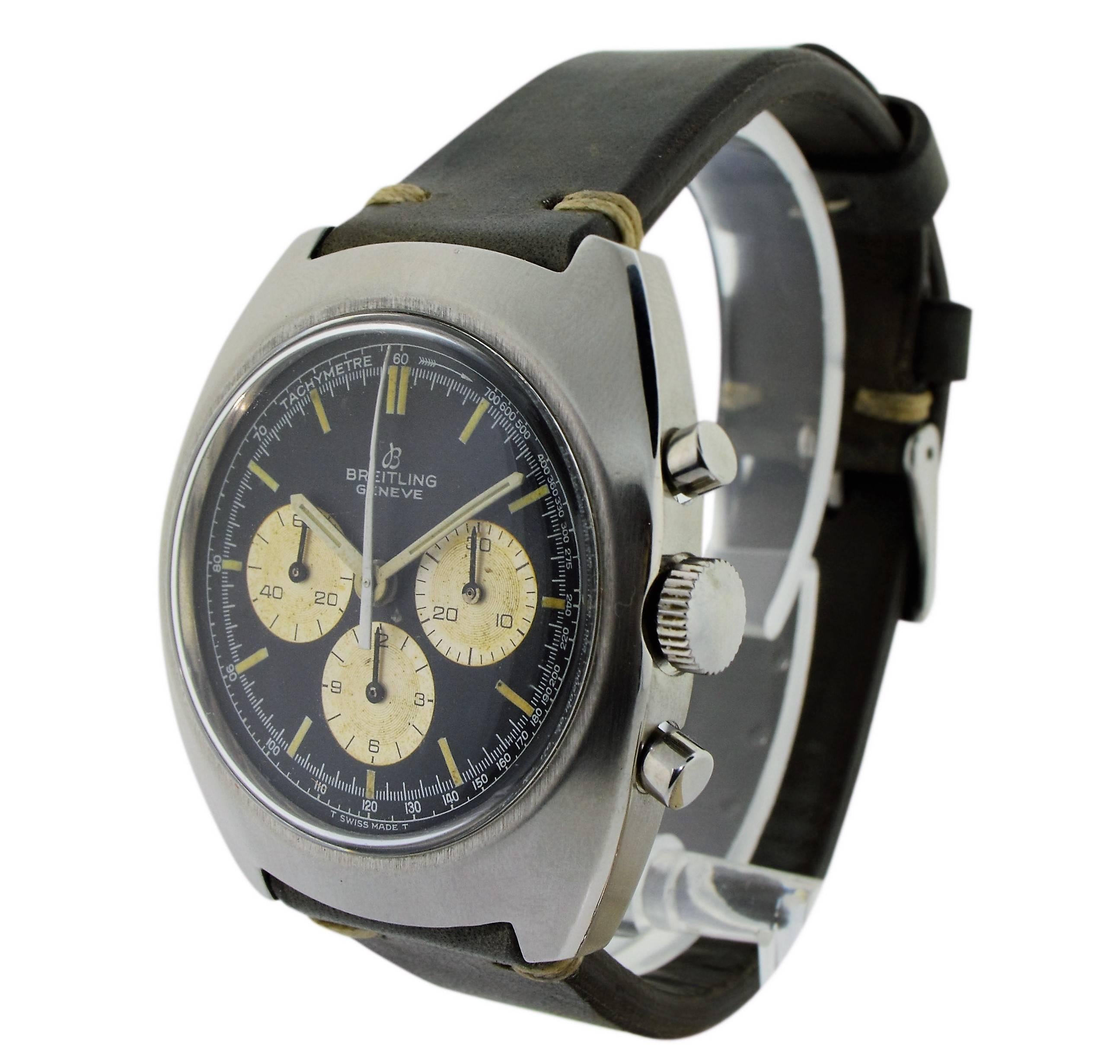 FACTORY / HOUSE: Breitling Watch Company
STYLE / REFERENCE: 1960's Modified Cushion Shape Case
MOVEMENT / CALIBER: Manually wound 
DIAL / HANDS: Rare and Original Black and Ivory dial
DIMENSIONS: 44mm X 39mm
ATTACHMENT / LENGTH:  Distressed