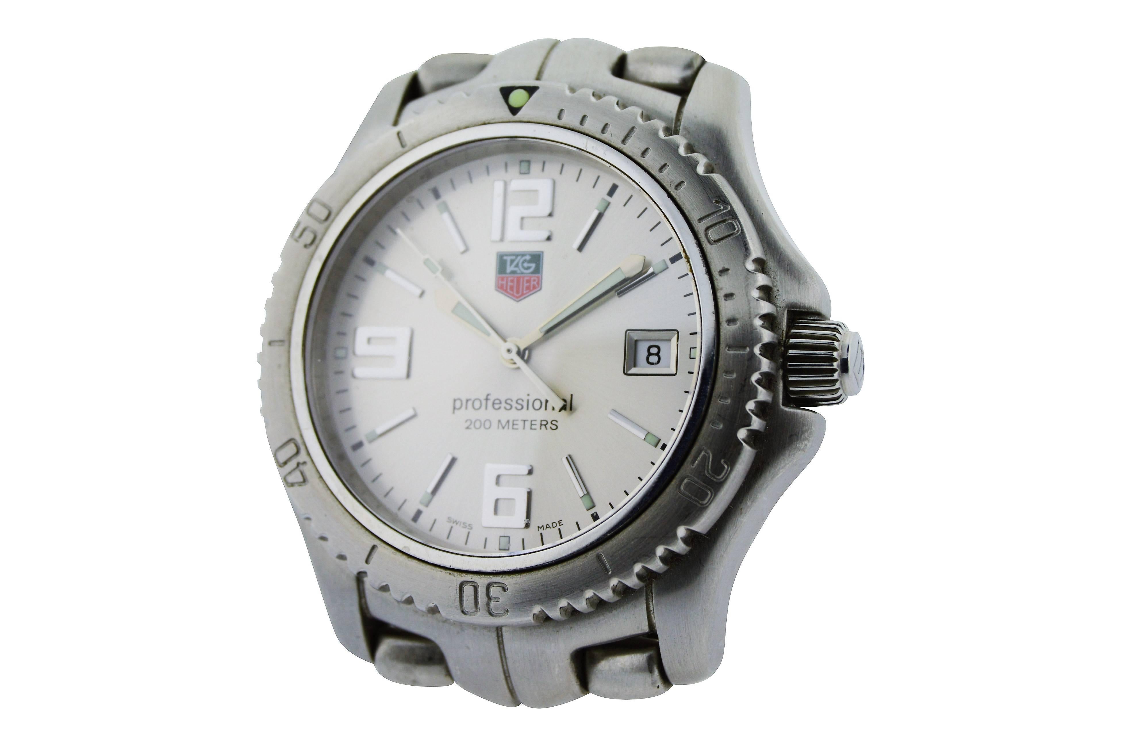 FACTORY / HOUSE: Tag Heuer 
STYLE / REFERENCE: Professional Model with Original Bracelet
METAL / MATERIAL: Stainless Steel 
DIMENSIONS: 44 mm  X  41mm
CIRCA: 1999
MOVEMENT / CALIBER: Quartz / Cal. 955.112
DIAL / HANDS: Original / Pyramid
