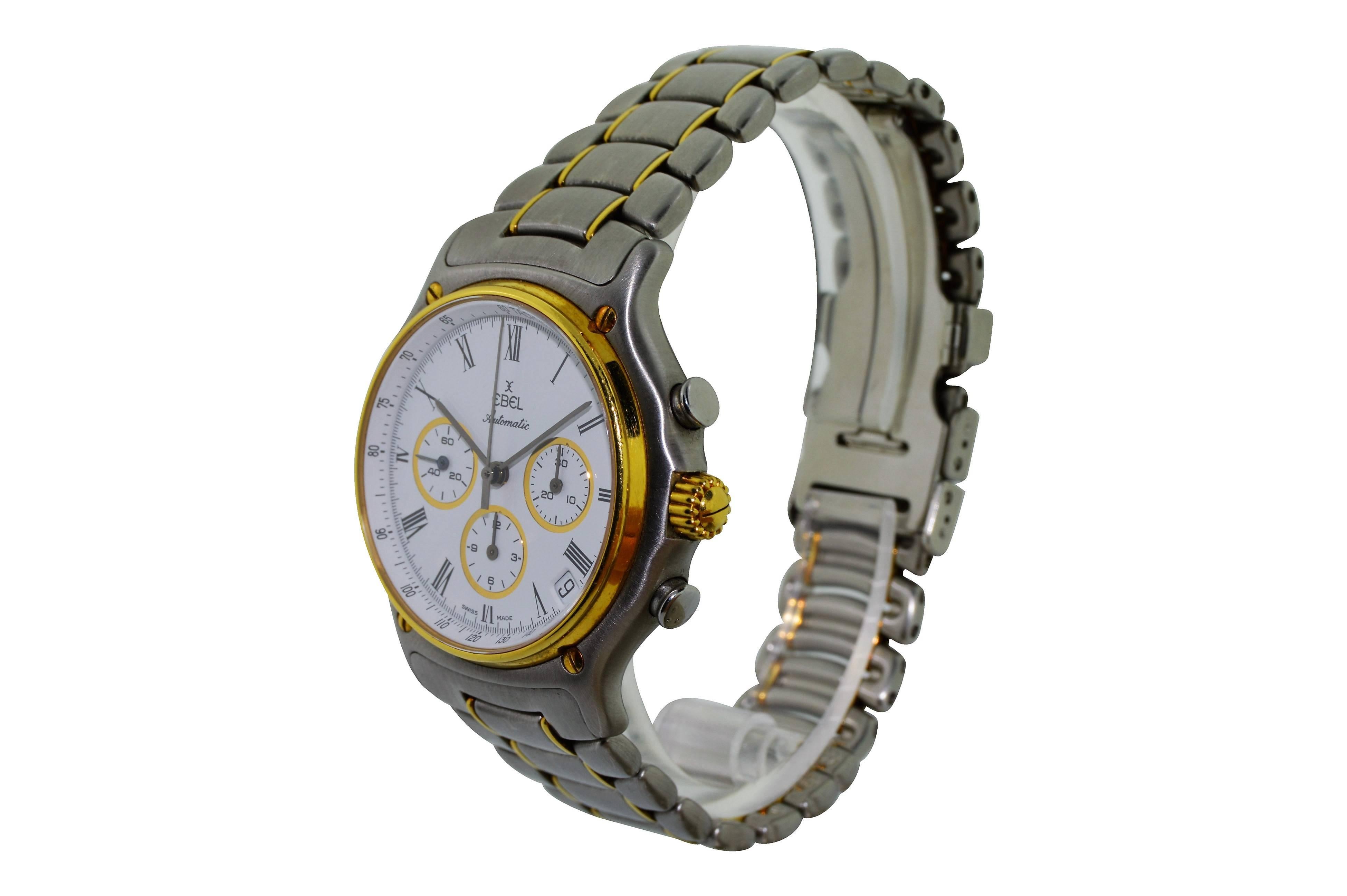 FACTORY / HOUSE: Ebel Watch Company
STYLE / REFERENCE: Two Tone Gold Chronograph
METAL / MATERIAL: Stainless Steel and Yellow Gold Automatic
DIMENSIONS:  42mm  X  36mm
CIRCA: 1980's
MOVEMENT / CALIBER: Swiss Zenith Caliber
DIAL / HANDS: White Roman