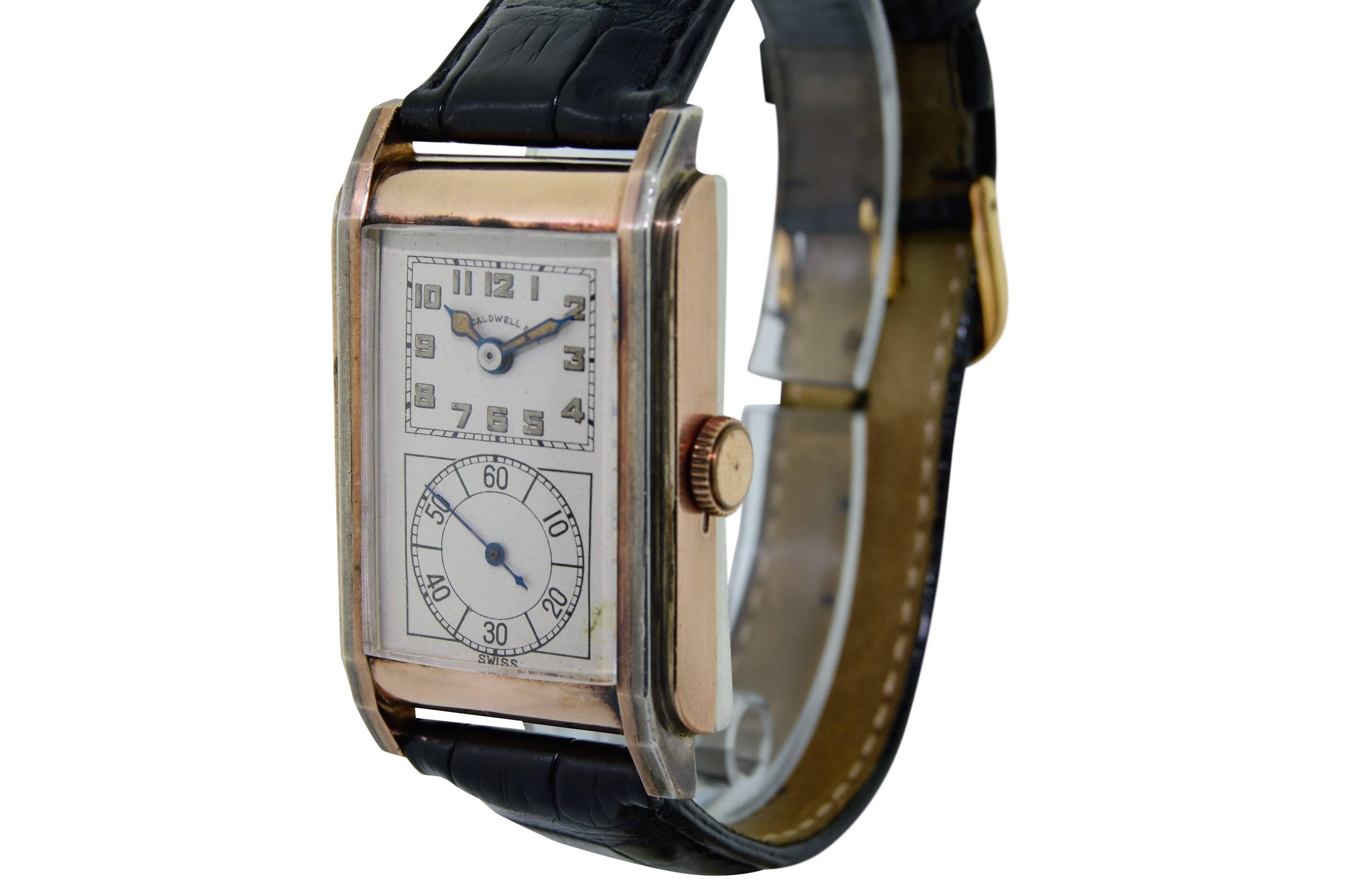 FACTORY / HOUSE: J.E. Cardwell
STYLE / REFERENCE: Drs. Double Dial 
METAL / MATERIAL: Silver and Rose Gold
DIMENSIONS:  45mm X 27mm
CIRCA: 1930's
MOVEMENT / CALIBER: Manual Winding / 15 Jewels
DIAL / HANDS: Luminous Arabic Numbers / Blued Steel