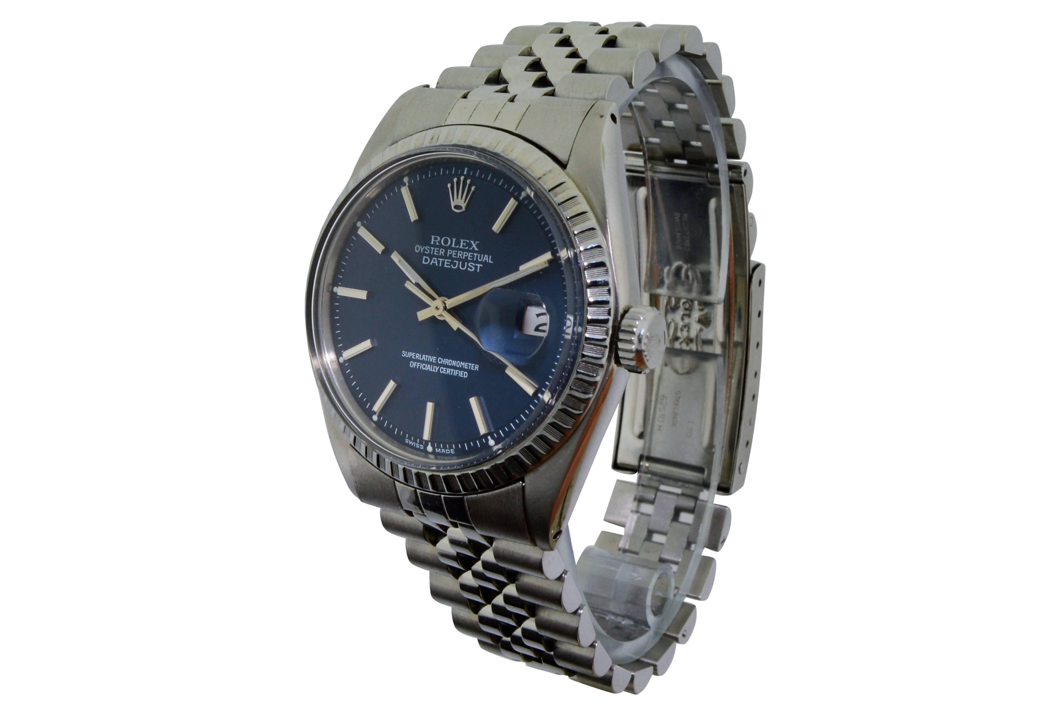 FACTORY / HOUSE: Rolex Watch Company
STYLE / REFERENCE: Datejust, 1601
MOVEMENT / CALIBER: 1570, 26 Jewels
DIAL / HANDS: Original, Blue With Batons, Baton Hands
DIMENSIONS: 36mm X 43mm
ATTACHMENT / LENGTH:  Stainless Steel Jubilee Bracelet, Full