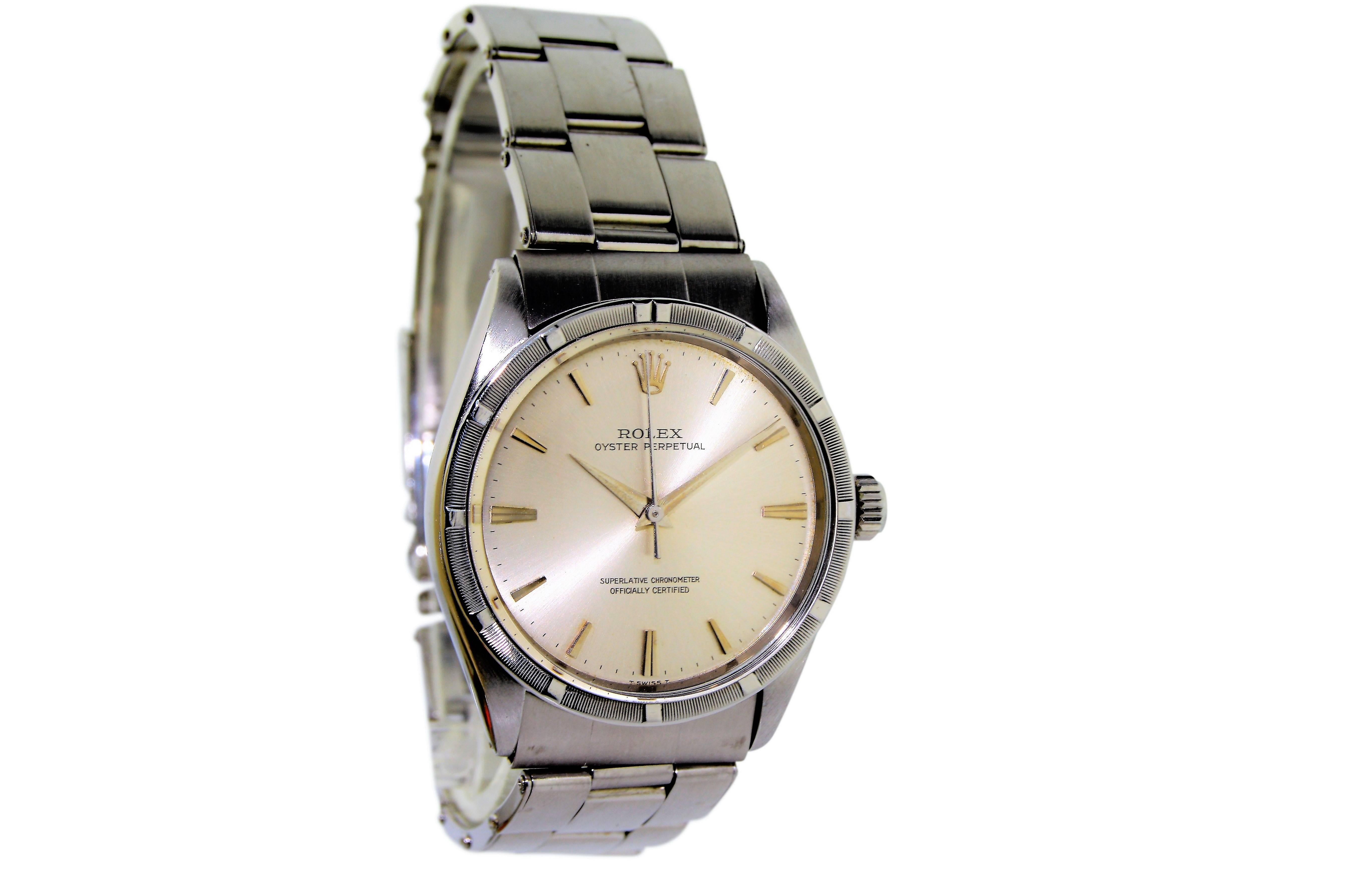 FACTORY / HOUSE: Rolex Watch Company
STYLE / REFERENCE: Oyster Perpetual / Ref. 1007
METAL / MATERIAL: Stainless Steel
DIMENSIONS:  39mm  X  34mm
CIRCA: 1964/65
MOVEMENT / CALIBER: Oyster Perpetual / Cal. 1560
DIAL / HANDS: Original Silver w/ Batons