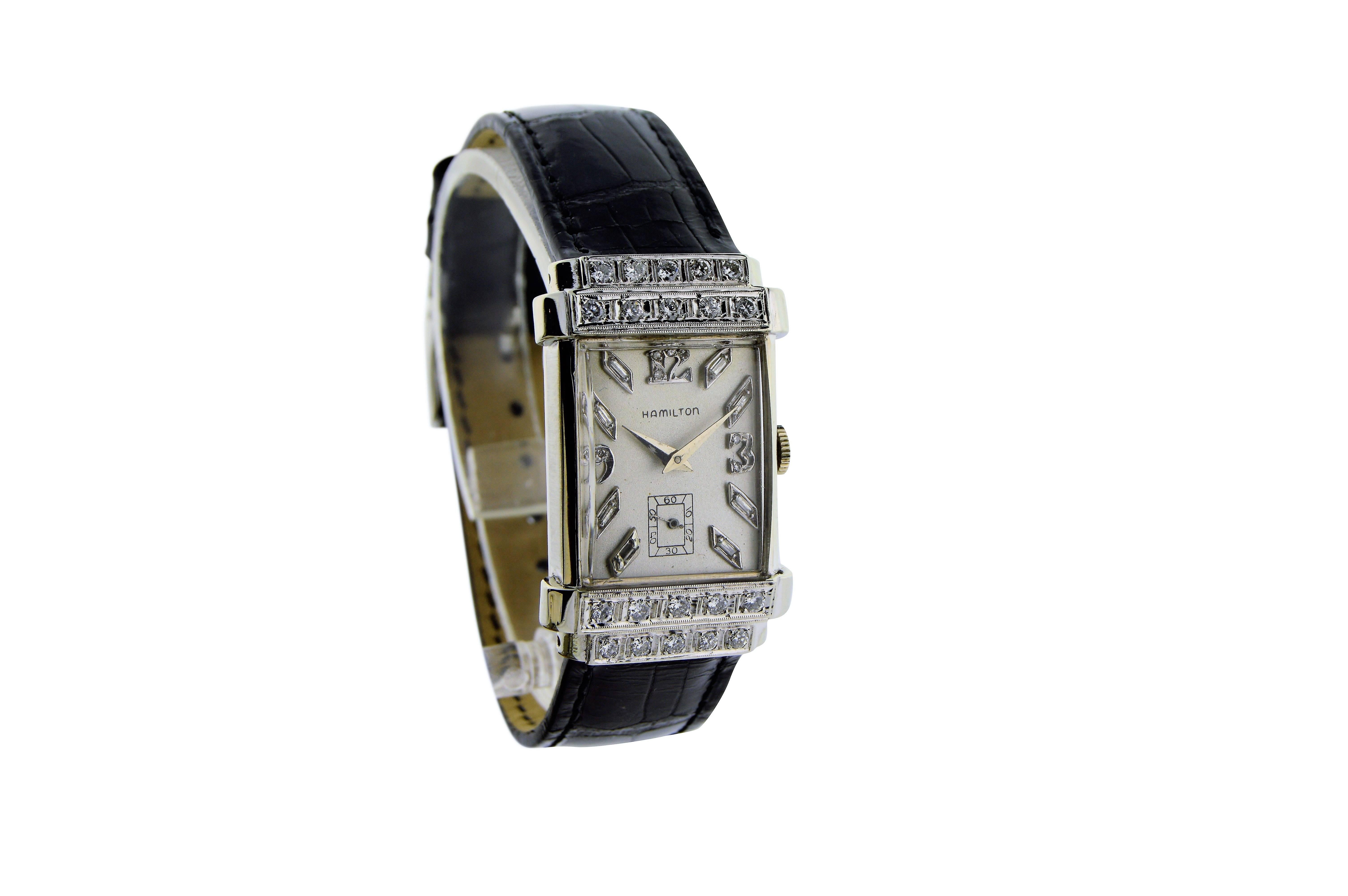 FACTORY / HOUSE: Hamilton Watch Company
STYLE / REFERENCE: Art Deco / Tank Style / Dress Model
METAL / MATERIAL: 14 Kt. White Gold
DIMENSIONS: 38mm X 25mm
CIRCA: 1940's
MOVEMENT / CALIBER: Manual Winding / 22 Jewels / Cal. 770
DIAL / HANDS: Original