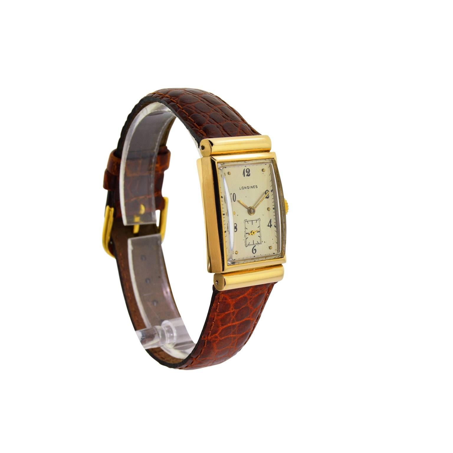 FACTORY / HOUSE:  Longines Watch Company
STYLE / REFERENCE: Art Deco / Tank Style
METAL / MATERIAL:  14 Kt Solid Yellow Gold
DIMENSIONS: 36mm X  20mm
CIRCA: 1940's
MOVEMENT / CALIBER: Manual Winding /  17 Jewels / Cal. 96
DIAL / HANDS: Silvered Dial