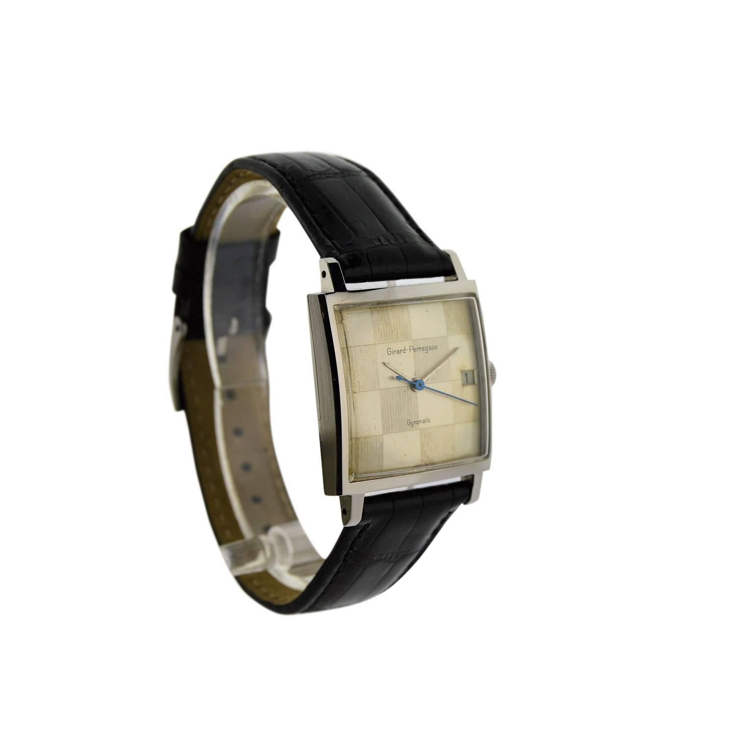 FACTORY / HOUSE: Girad Perregaux
STYLE / REFERENCE: Square Moderne 
METAL / MATERIAL: Stainless Steel
DIMENSIONS: 39 mm X 29 mm
CIRCA: 1960's
MOVEMENT / CALIBER: AutomaticWinding / 39 Jewels 
DIAL / HANDS: Original Silvered Checkered / Blued Steel
