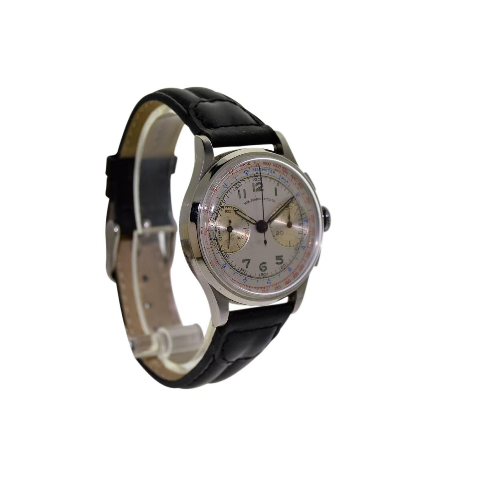 FACTORY / HOUSE: Hyde Park for Abercrombie and Fitch
STYLE / REFERENCE: Art Deco / Chronograph
METAL / MATERIAL: Stainless Steel
CIRCA: 1940's
DIMENSIONS: 42mm X 35mm
MOVEMENT / CALIBER: Manual Winding / 17 Jewels 
DIAL / HANDS: Silvered with Arabic