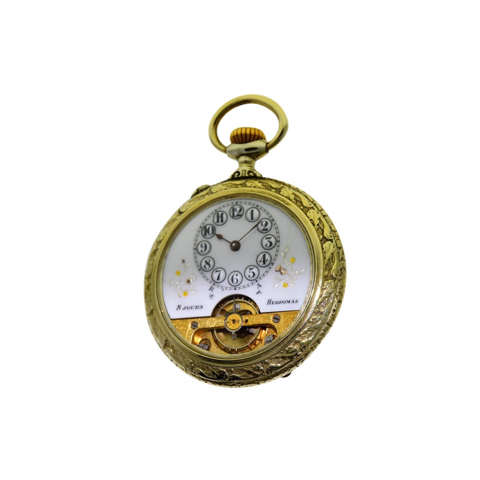 FACTORY / HOUSE: Hebdomas Watch Company
STYLE / REFERENCE: Open Faced Pocket Watch / Exposed Balance
METAL / MATERIAL: Nickel Silver
CIRCA: 1920s
DIMENSIONS: 51mm 
MOVEMENT / CALIBER: Manual Winding / 17 Jewels 
DIAL / HANDS: Enamel Original /