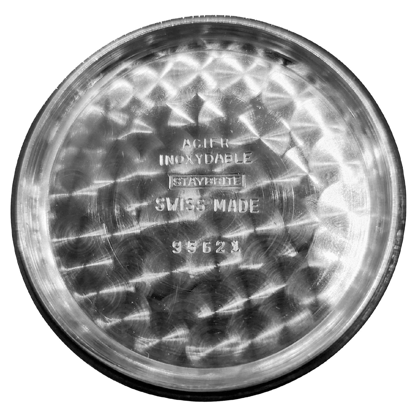 USINE / MAISON : Turler Watch Company
STYLE / RÉFÉRENCE : Round Two Register Chronograph
METAL / MATERIAL : Acier inoxydable
DIMENSIONS : Longueur 42mm  X Diamètre 36mm
CIRCA : 1953
MOUVEMENT / CALIBRE : Remontage manuel / 17 Jewell / Valjoux