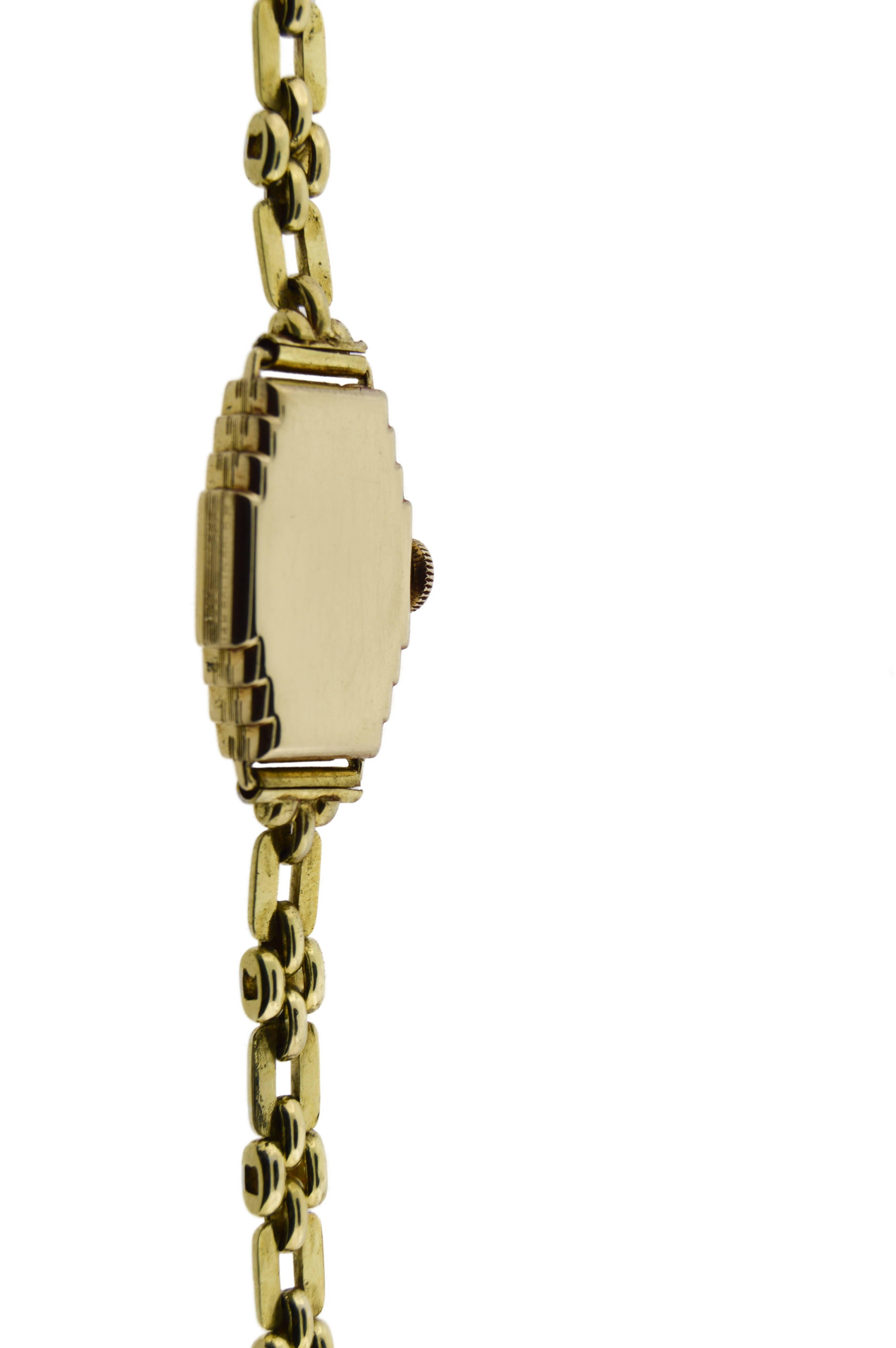 14kt solid gold ladies wrist watch with associated Art Deco gold filled bracelet. The bracelet is designed with unique safety catch. 17 jewel high quality movement made by the Elgin National Watch Company in Elgin, Illinois. This is a great looking
