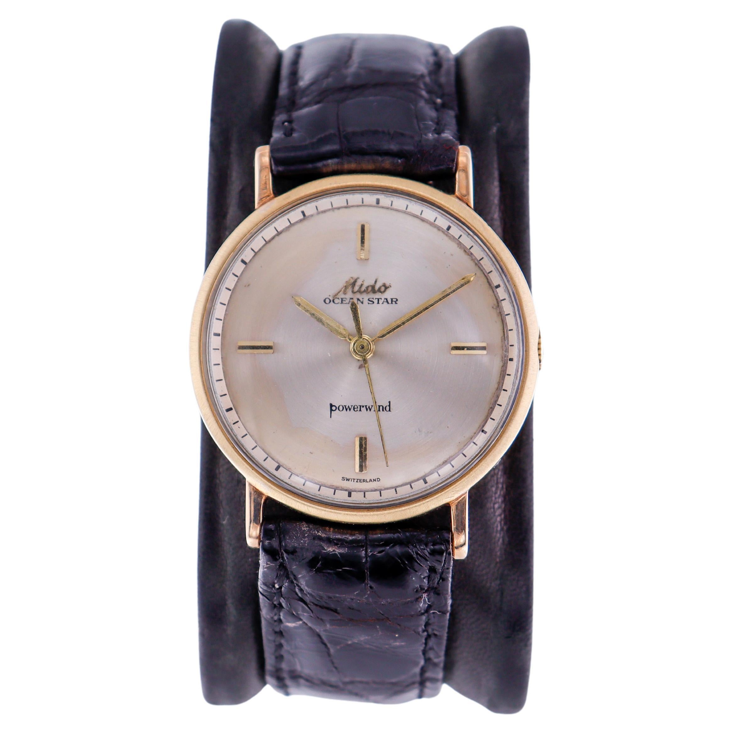 mido 18k gold watch