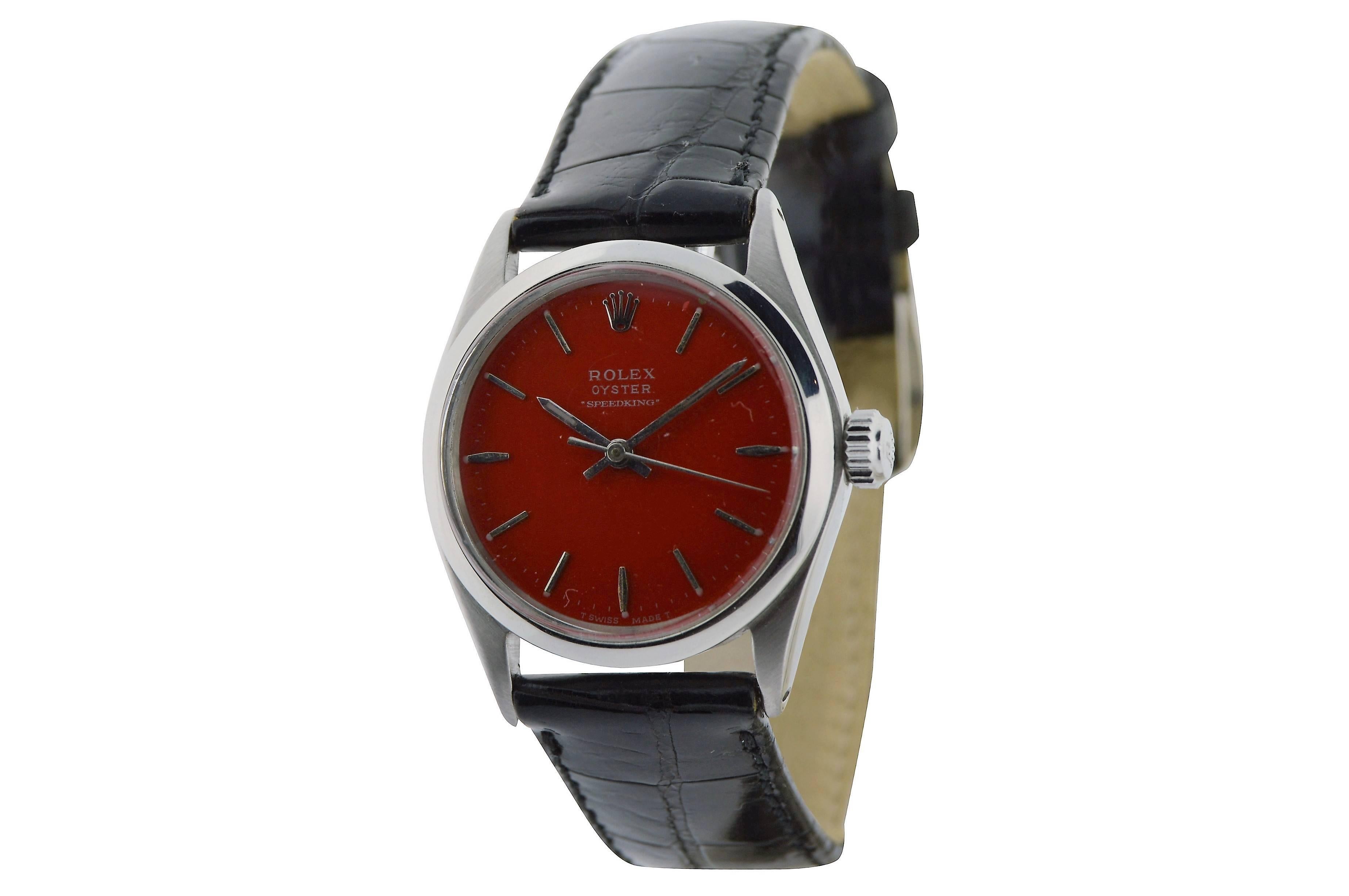 FACTORY / HOUSE: Rolex Watch Company 
STYLE / REFERENCE: Speedking / Oyster
METAL / MATERIAL: Stainless Steel 
DIMENSIONS:  35mm  X  30mm
CIRCA: 1950's
MOVEMENT / CALIBER: 17 Jewels / 10.5 
DIAL / HANDS: Red, Baton Markers / Baton Hands
ATTACHMENT /