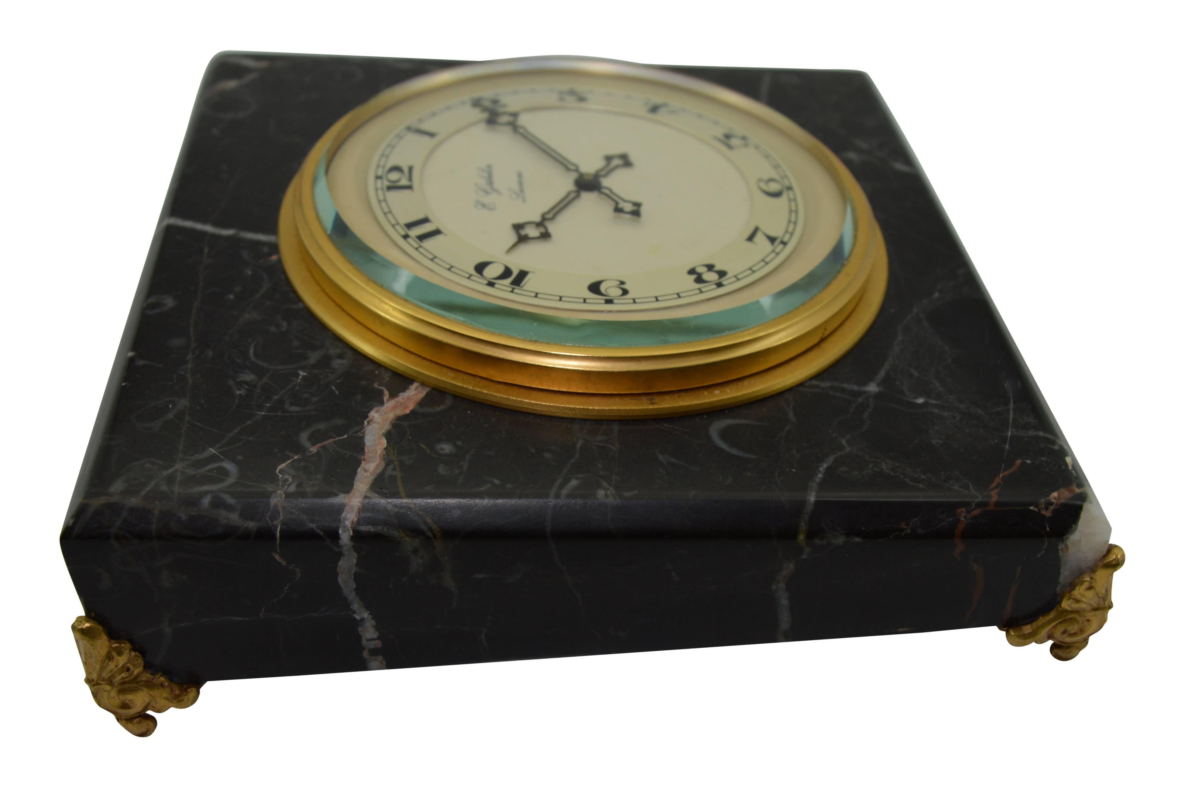 FACTORY / HOUSE: E. Gubelin Watch Company
STYLE / REFERENCE: Table Clock
METAL / MATERIAL: Stone
CIRCA / YEAR: 1930's
DIMENSIONS: 5
