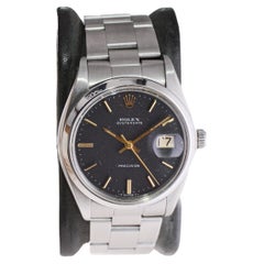 Retro Rolex Stainless Steel Oysterdate with Rare Factory Original Black Dial 1970's