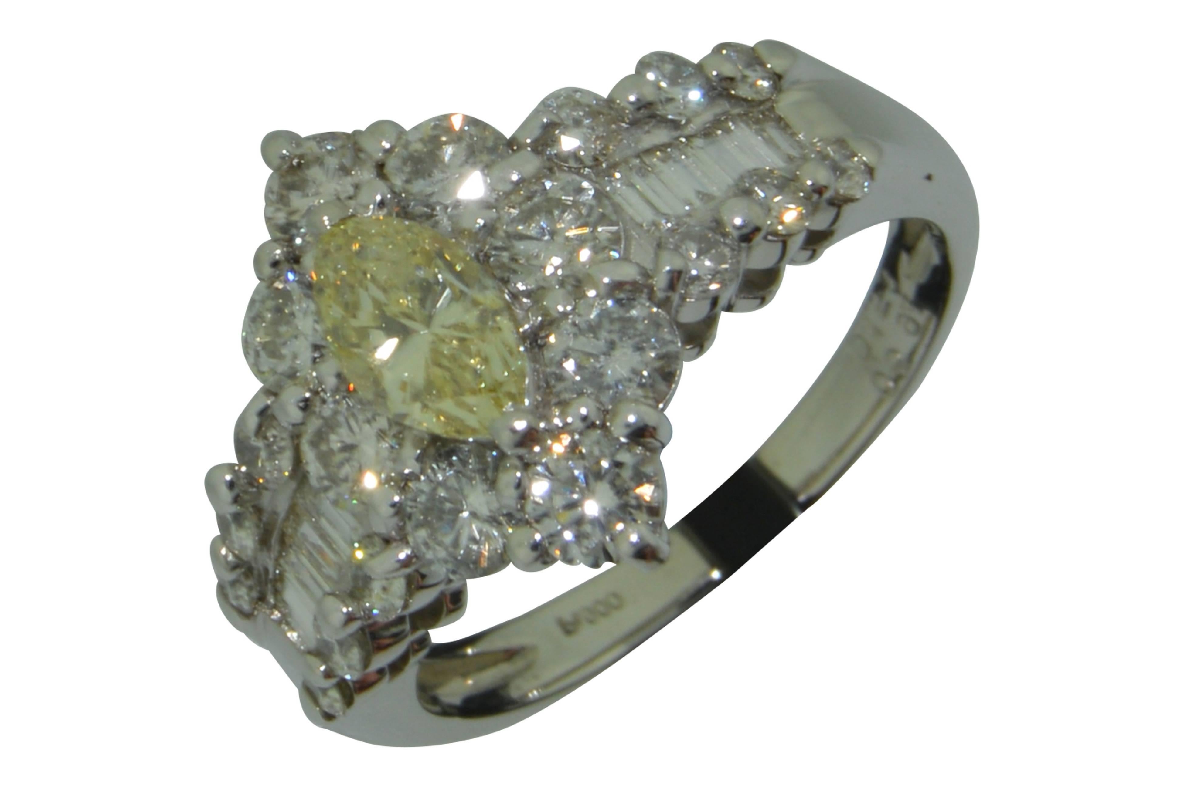 Modern Estate Fancy Light Yellow Diamond and White Diamond Halo Ring