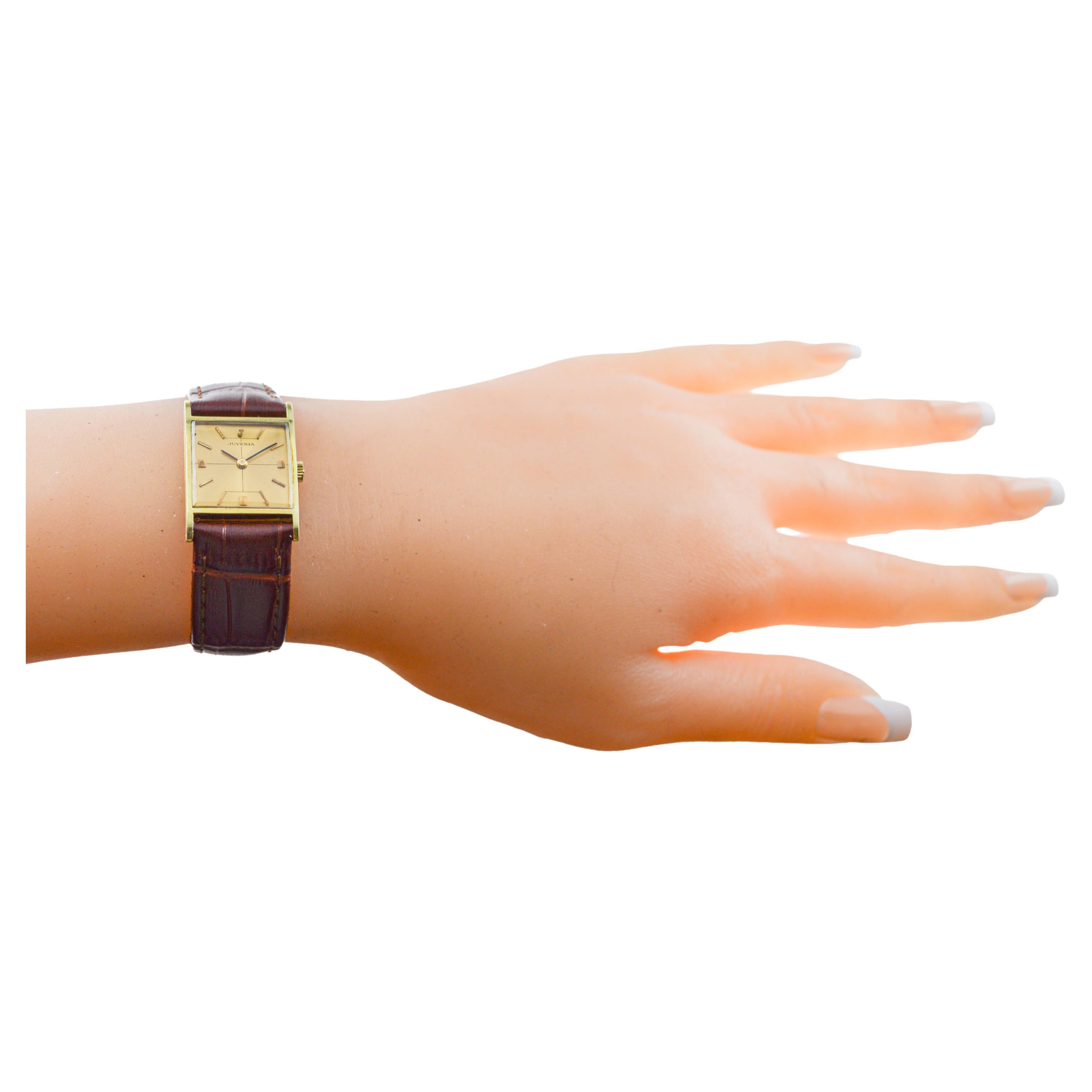 FACTORY / HOUSE: Juvenia Watch Company
STYLE / REFERENCE: Art Deco
METAL / MATERIAL: Yellow Gold-Filled
CIRCA / YEAR: 1950's
DIMENSIONS / SIZE: Length 28mm X Width 19mm
MOVEMENT / CALIBER: Manual Winding / 17 Jewels / Caliber 765
DIAL / HANDS: