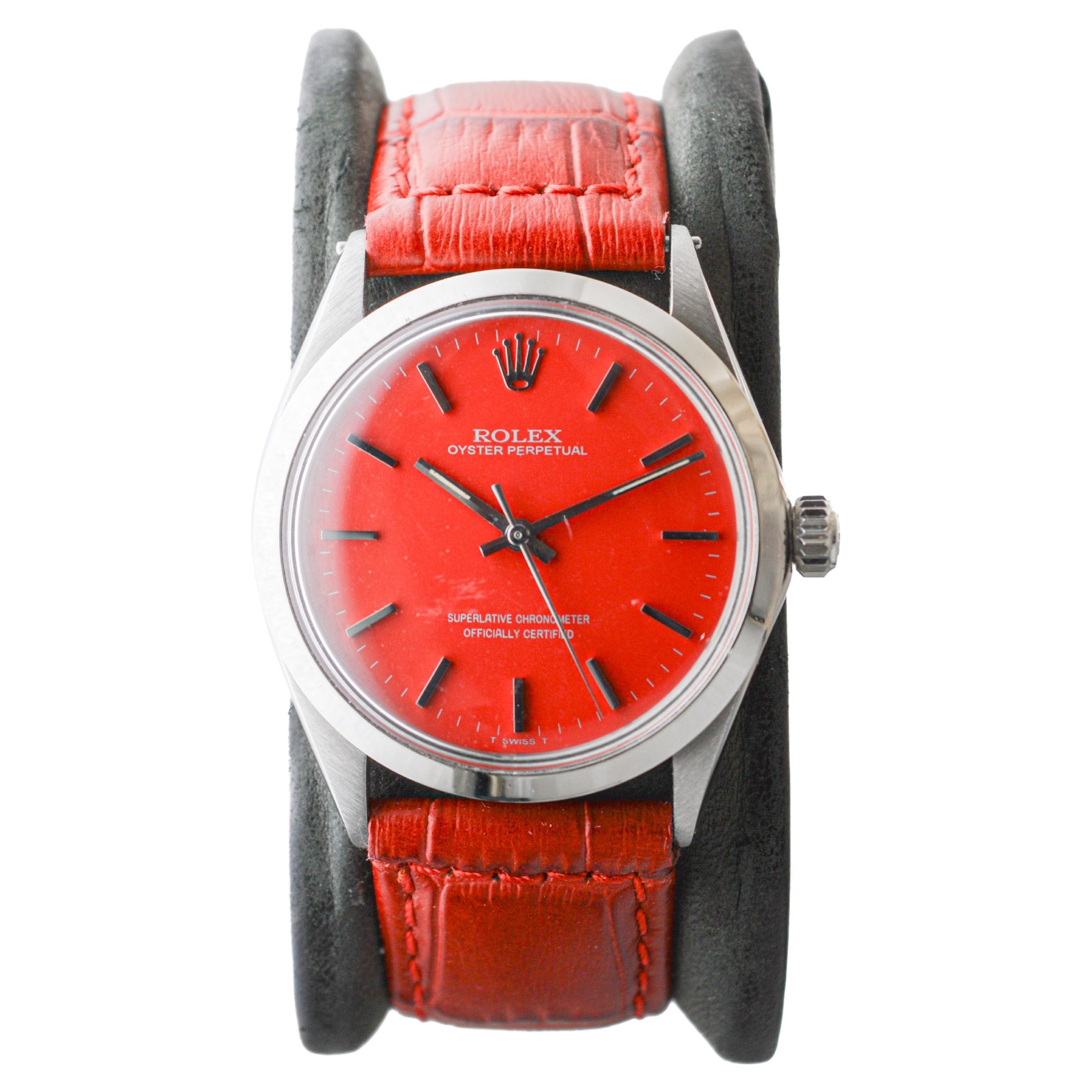 Rolex Oyster Perpetual en acier inoxydable avec cadran rouge personnalisé circa, 1960's