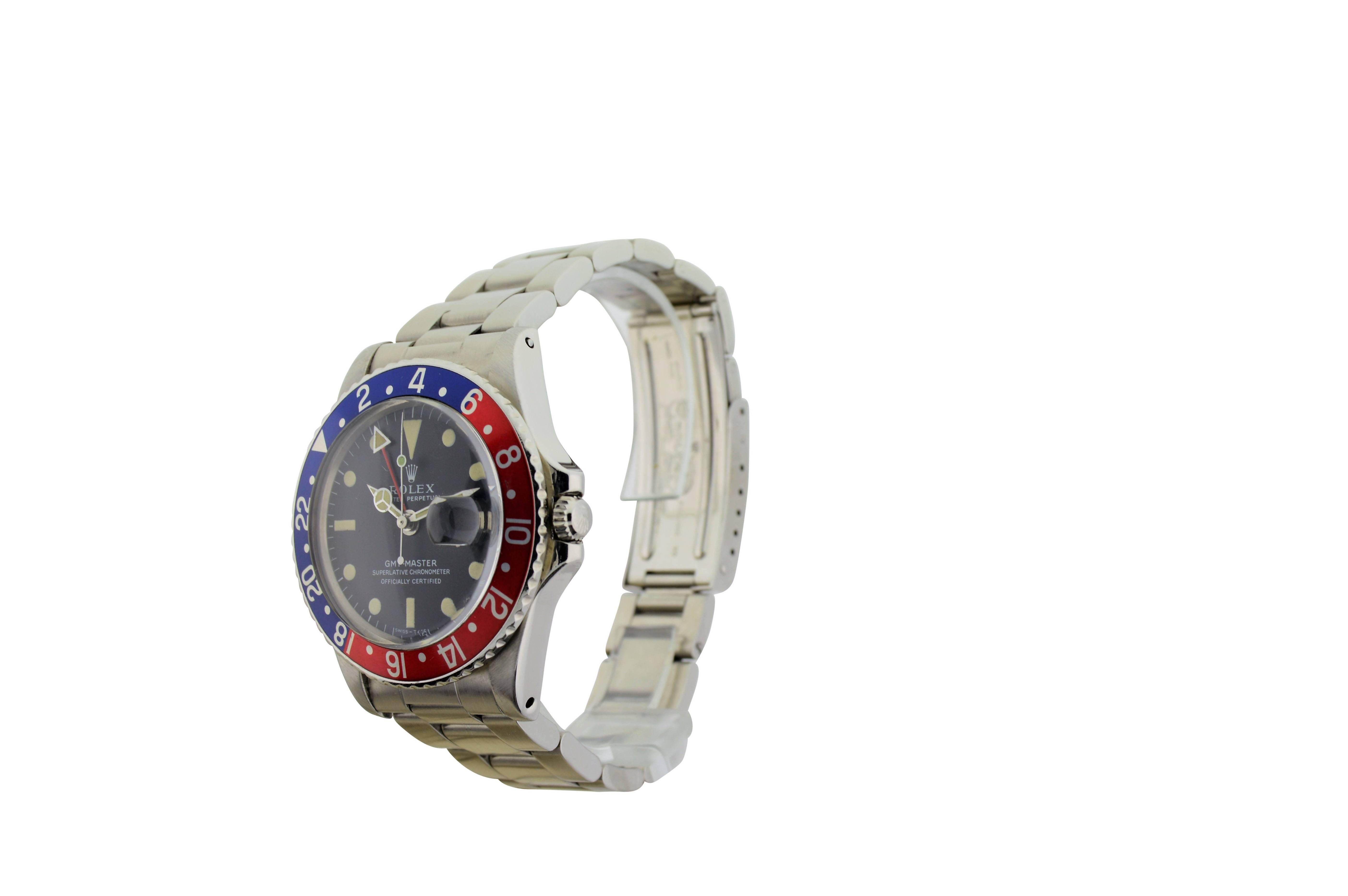 FACTORY / HOUSE: Rolex Watch Company
STYLE / REFERENCE: GMT / Ref. 1675 
METAL / MATERIAL: Stainless Steel 
DIMENSIONS:  47mm  X  39mm
CIRCA: 1972
MOVEMENT / CALIBER: 26 Jewels / Perpetual Winding / CAl. 1570
DIAL / HANDS: Original Black / Hands,