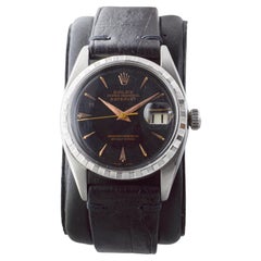 Rolex Steel Datejust with Rare Engine Turned Bezel 1954 Red and Black Datewheel