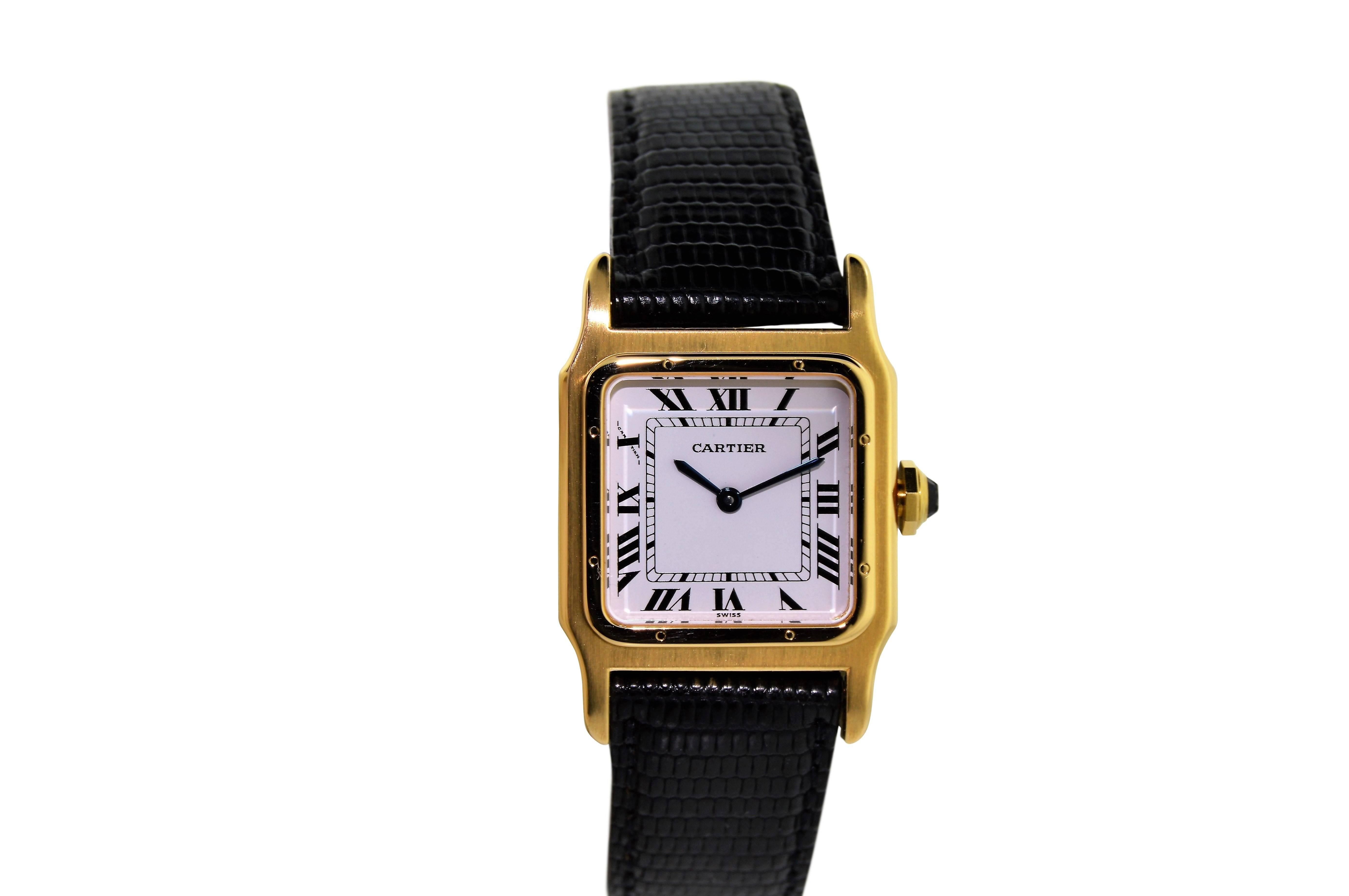 FACTORY / HOUSE: Cartier Watch Company
STYLE / REFERENCE: Santos Dumont 
METAL / MATERIAL: 18 Kt. Yellow Gold  
DIMENSIONS:  35mm  X  25mm
CIRCA: 1970's
MOVEMENT / CALIBER: Manual Winding / 17 Jewels
DIAL / HANDS: Original Roman / Blued Steel Leaf