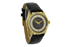 Rolex Yellow Gold Oyster Perpetual Engine Turned Bezel Dated 1960