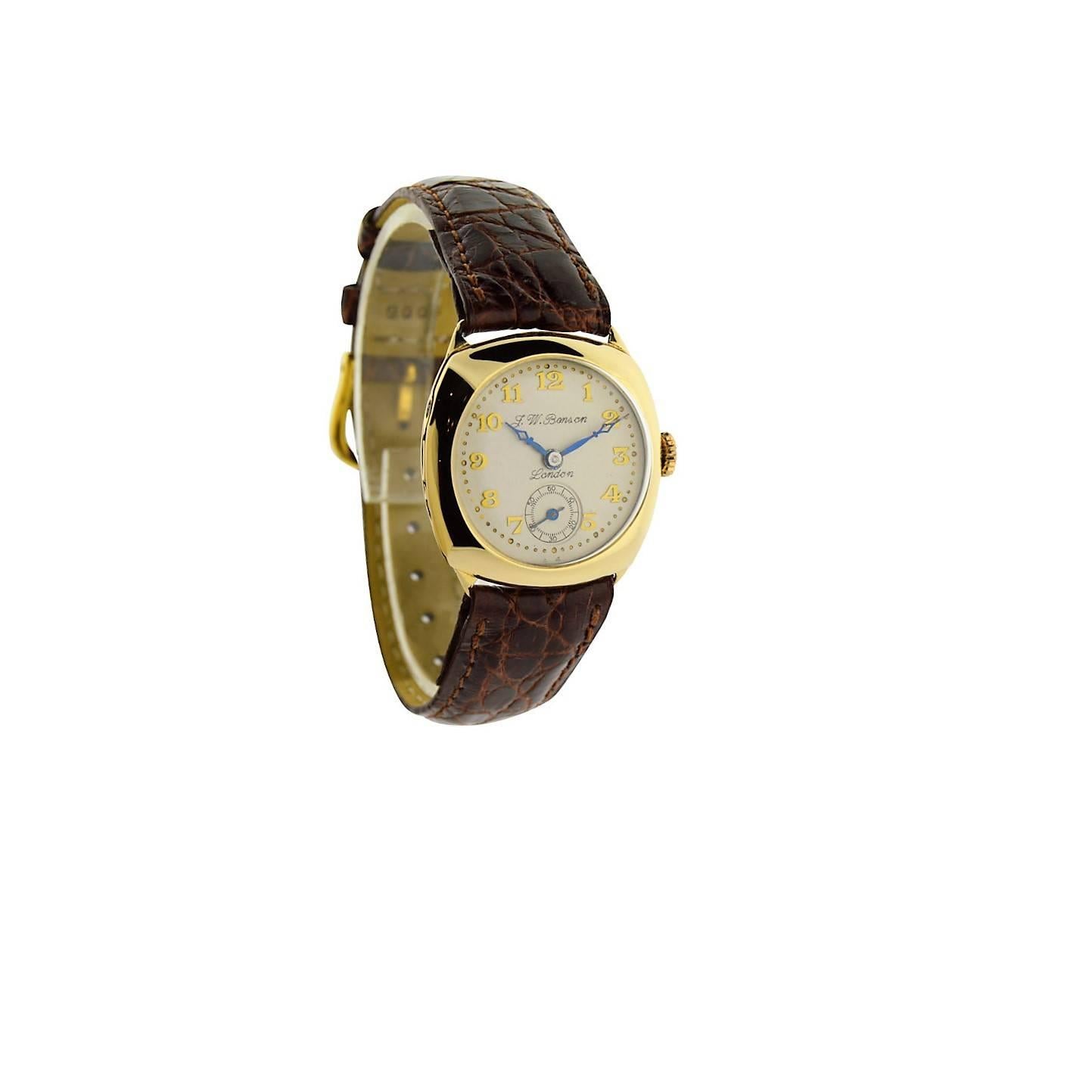 FACTORY / HOUSE: J. W. Benson / London
STYLE / REFERENCE: Cushion Shaped / Military Style
METAL / MATERIAL: 9Kt Yellow Gold
DIMENSIONS:  32mm  X  30mm
CIRCA: 1920's
MOVEMENT / CALIBER: Manual Winding / 15 Jewels
DIAL / HANDS: Silvered / Arabic