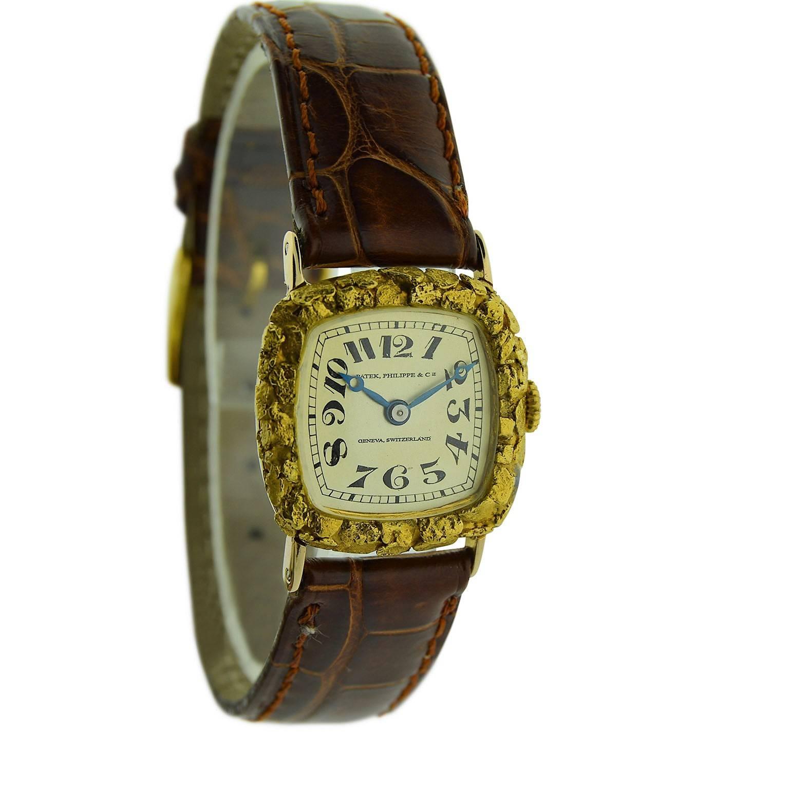 FACTORY / HOUSE: Patek Philippe & Co.
STYLE / REFERENCE: Cushion Shape
METAL / MATERIAL: 18Kt Yellow Gold
DIMENSIONS:  30mm  X  24mm
CIRCA: 1918/ 20
MOVEMENT / CALIBER: Manual Winding / 18 Jewels / 8 Adjustments 
DIAL / HANDS: Silver w/ Kiln Fired