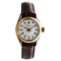Montre Rolex Oyster Perpetual bicolore pour femme, datant des années 1960 environ