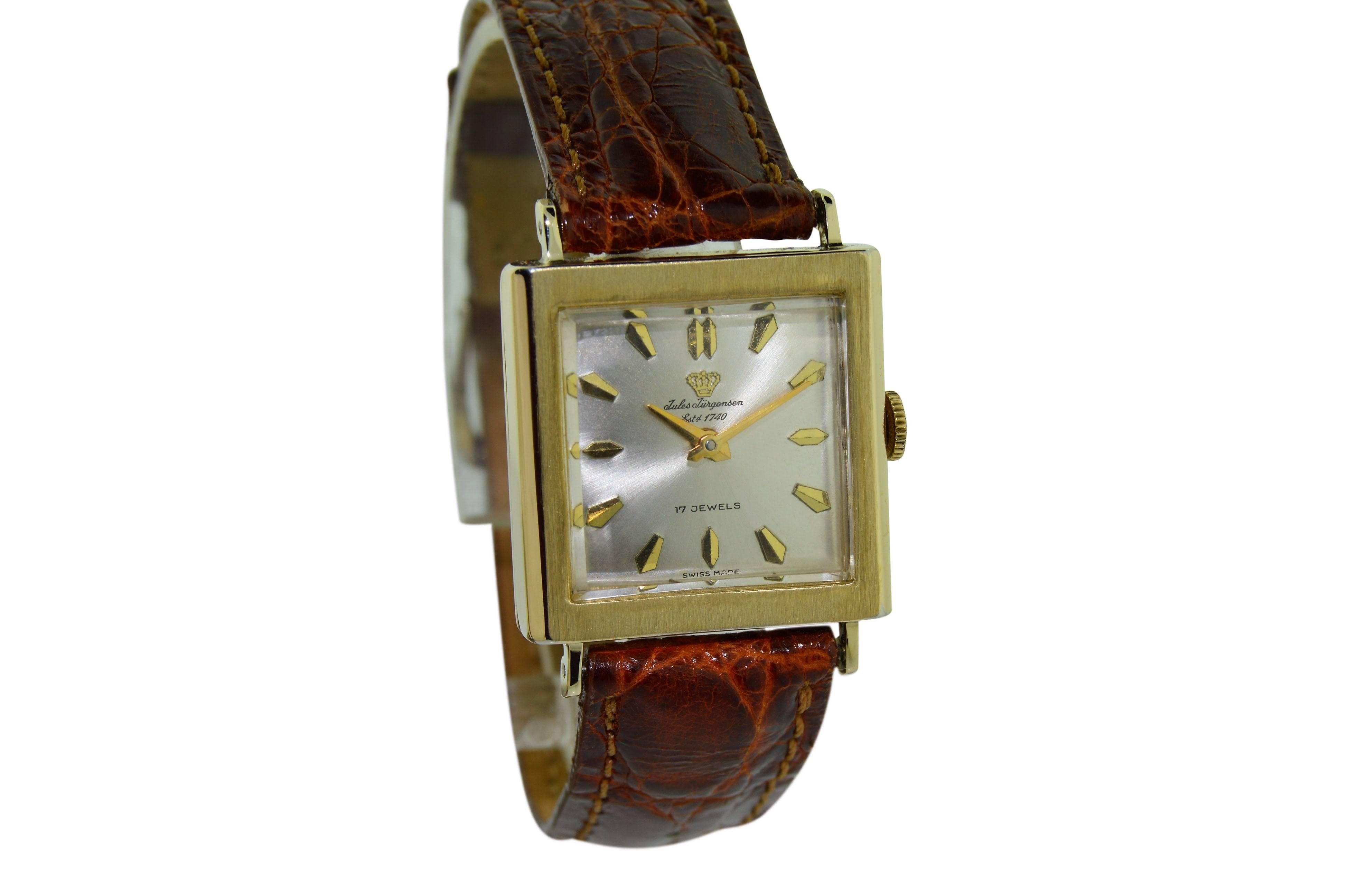 FACTORY / HOUSE: Jules Jurgensen Watch Company
STYLE / REFERENCE: Art Deco / Tank Style
METAL / MATERIAL: 14 Kt Gold Filled
DIMENSIONS:  32mm  X  25mm
CIRCA: 1950's
MOVEMENT / CALIBER: Winding / 17 Jewels / 
DIAL / HANDS: Original Dial w/ Baton