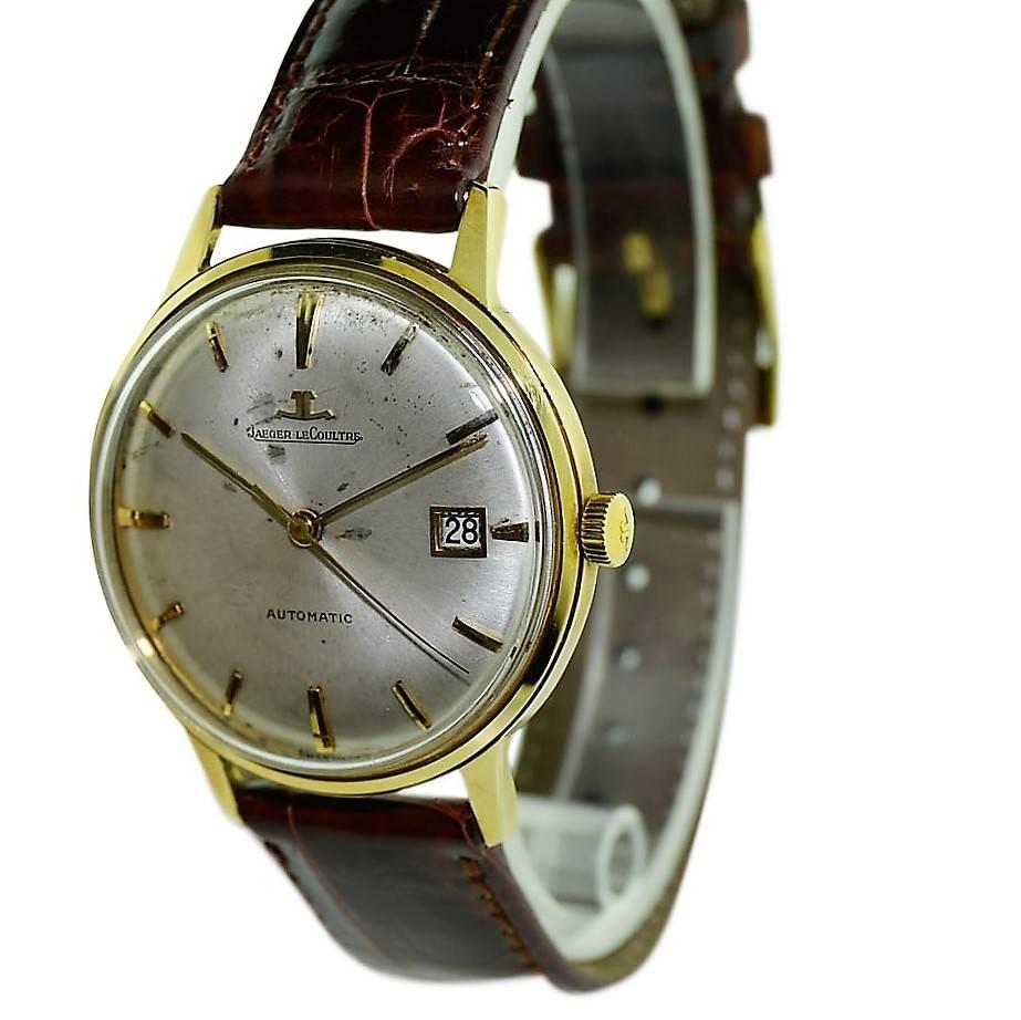 FACTORY / HOUSE:  LeCoultre Watch Company
STYLE / REFERENCE: Round Classical Style / Auto Date
METAL / MATERIAL:  14Kt. Yellow Gold 
DIMENSIONS: Length 42mm X Diameter 35mm
CIRCA: 1950's
MOVEMENT / CALIBER:  Self Winding /  17 Jewels / Cal. K881 /