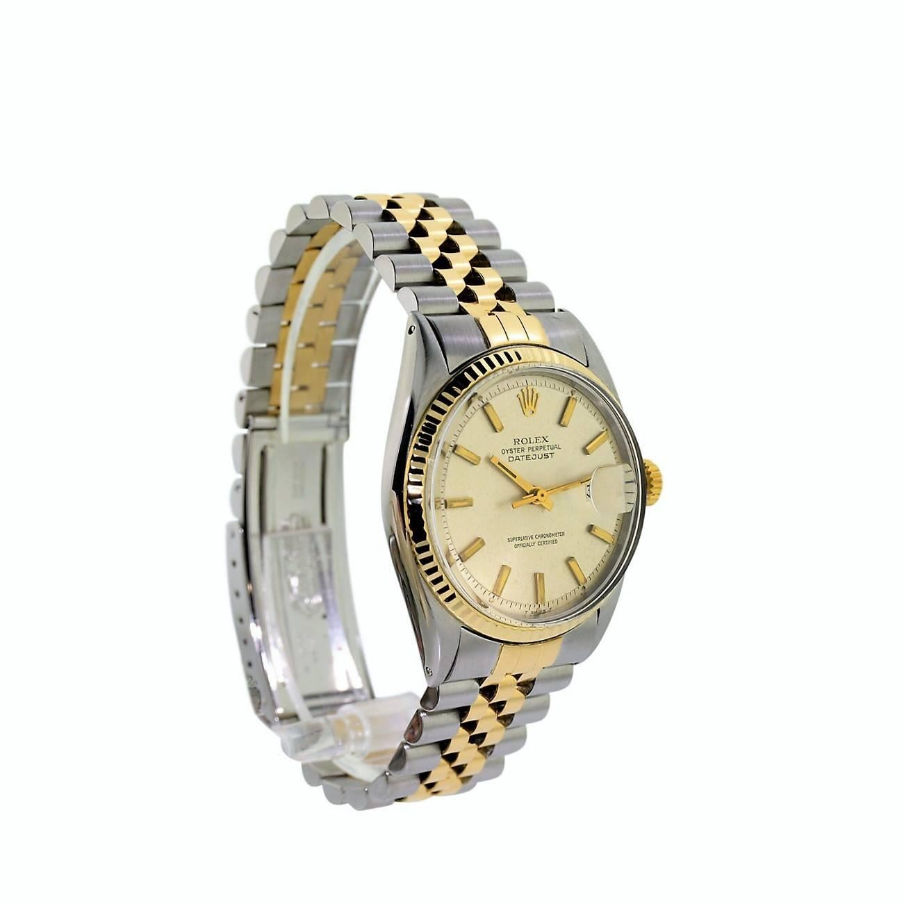 FACTORY / HOUSE: Rolex Watch Company
STYLE / REFERENCE: Datejust /  1601
METAL / MATERIAL: Stainless Steel / 18Kt. Yellow Gold
DIMENSIONS:  43mm  X  36mm
CIRCA: 1970 / 71
MOVEMENT / CALIBER: Perpetual Winding /  26 Jewels / Cal. 1570
DIAL / HANDS: