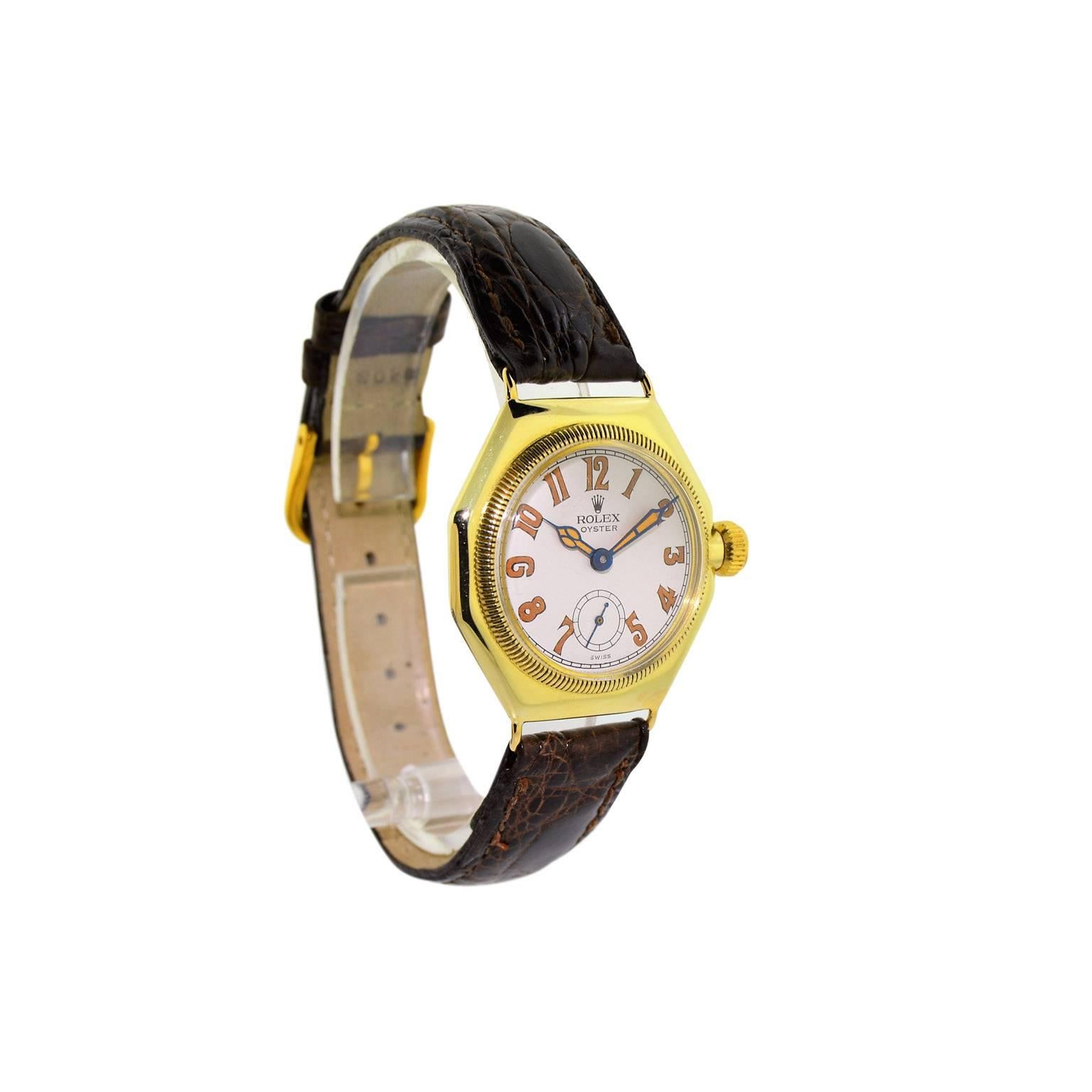 FACTORY / HOUSE: Rolex Watch Company
STYLE / REFERENCE: Oyster Octagon / English Patents
METAL / MATERIAL: 14Kt Solid Yellow Gold
DIMENSIONS: 40mm X 32mm
CIRCA: 1935 / 1936
MOVEMENT / CALIBER:  Manual Winding /  15 Jewels / Adjusted to six positions