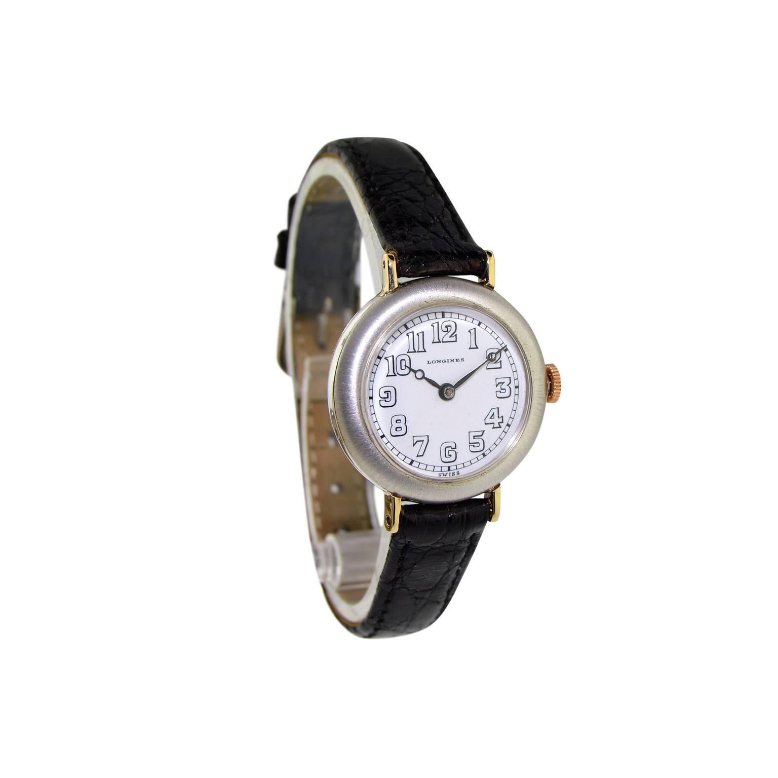 FACTORY / HOUSE: Longines Watch Company
STYLE / REFERENCE: Art Deco / Round
METAL / MATERIAL: Sterling Silver / Rose Gold Lugs
DIMENSIONS:  34mm X 29mm
CIRCA: 1912
MOVEMENT / CALIBER: Manual Winding / 17 Jewels 
DIAL / HANDS: Original / 