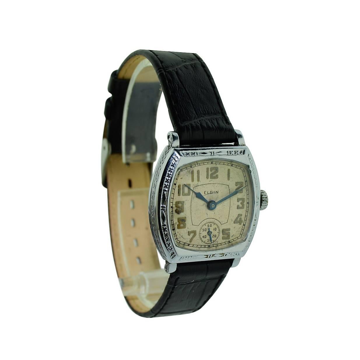 FACTORY / HOUSE:  Elgin Watch Company
STYLE / REFERENCE: Art Deco
METAL / MATERIAL:  Stainless Steel
DIMENSIONS: 35 mm  X 29 mm
CIRCA: 1920's
MOVEMENT / CALIBER:  Manual Winding / 7 Jewels / Cal. 3.0
DIAL / HANDS: 
ATTACHMENT / LENGTH:   Alligator