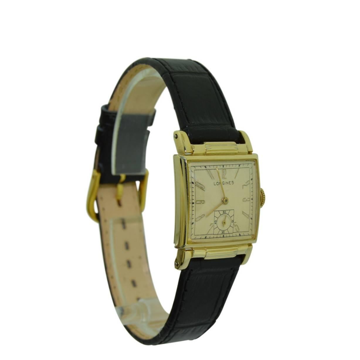 FACTORY / HOUSE:  Longines Watch Company
STYLE / REFERENCE: Art Deco 
METAL / MATERIAL:   14 Kt Yellow Gold Filled
DIMENSIONS:  34 mm  X 22 mm
CIRCA:  1940's
MOVEMENT / CALIBER:  Manual Winding / 17 Jewels / Cal. 8 lignes 
DIAL / HANDS: Original