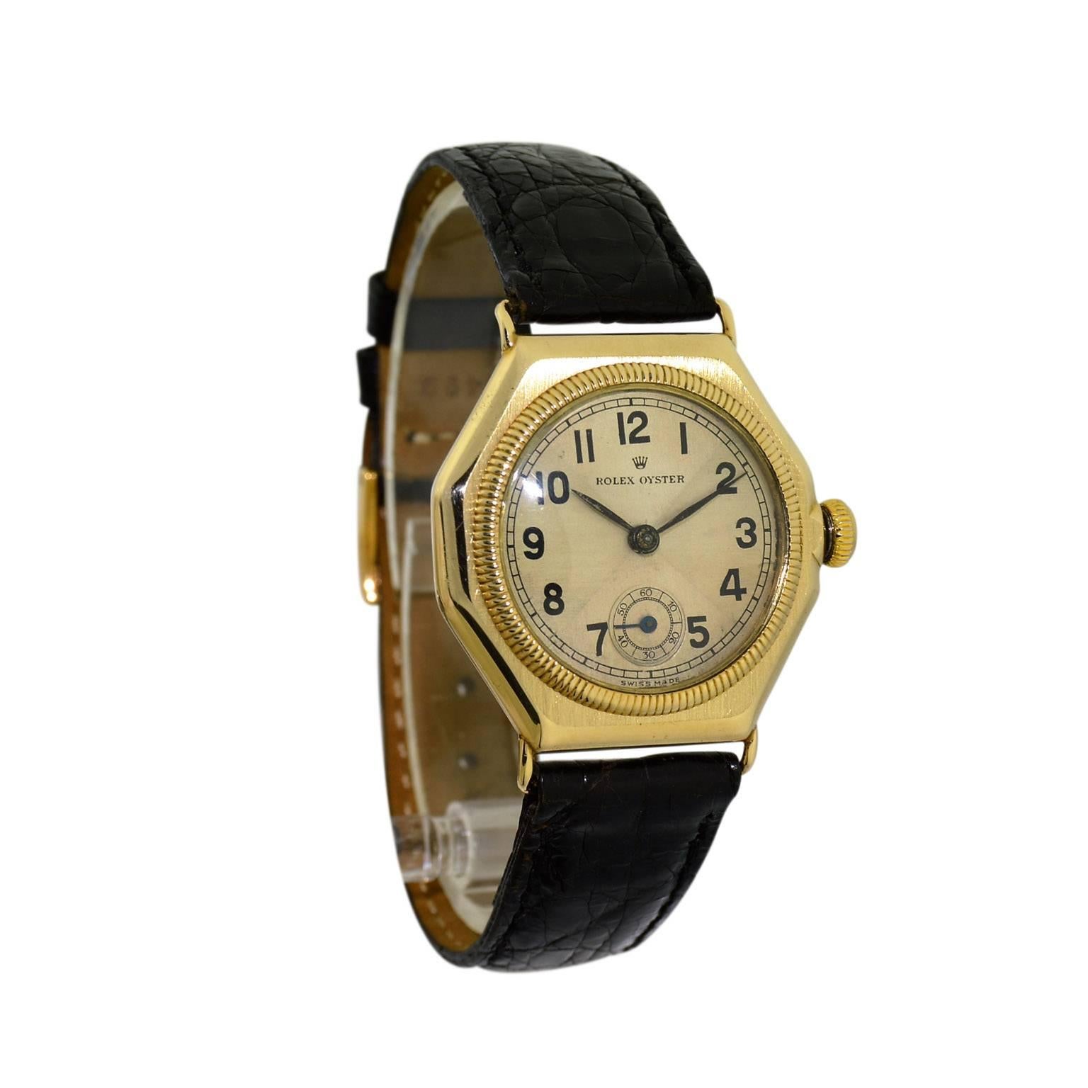 FACTORY / HOUSE: Rolex Watch Company
STYLE / REFERENCE: Octagon
METAL / MATERIAL: 9Ct. Yellow Gold English Market
DIMENSIONS: 37mm X 32mm
CIRCA: 1936 / 1937
MOVEMENT / CALIBER:  Manual Winding /  15 Jewels 
DIAL / HANDS: Original Rare, Quartered