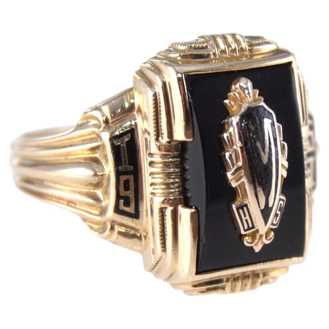UNISEX RING
STYLE / REFERENCE: Art Deco
METAL / MATERIAL: 10Kt. Solid Gold
CIRCA / YEAR: 1951
SIZE: 6.25

This is a darling, High School class ring crafted in 10Kt Solid Yellow Gold in a classic Art Deco Style design with a stylized gold and enamel