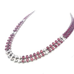 18K White Gold Riviera Necklace with 8.8ct Oval & Round Diamonds and 71ct Rubies