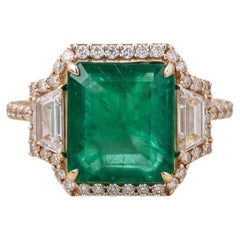 18K YG Engagement Ring 0.85ct Round & Trapezoid H VS Diamonds and 4.5ct Emerald