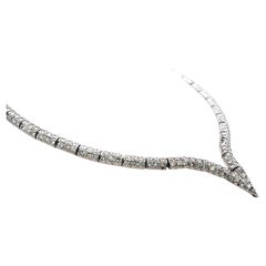 Vintage Gold Silver and Palladium V-shaped Necklace with 10.92 Carat Diamonds