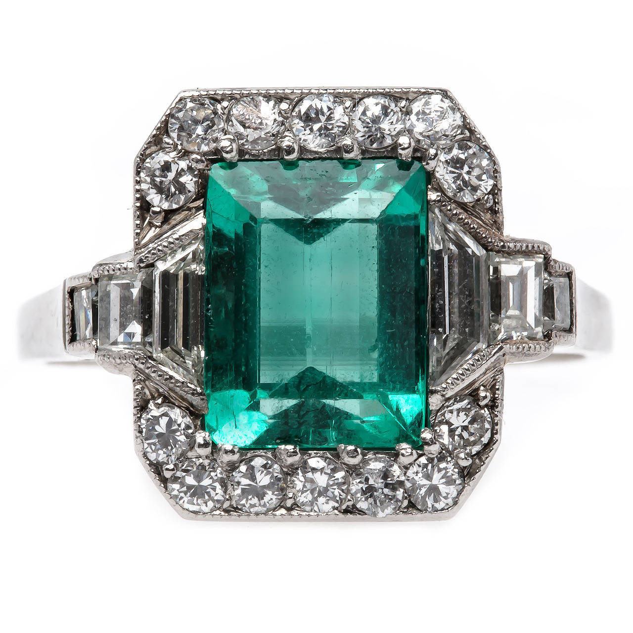 Timeless Art Deco Emerald Diamond Platinum Engagement Ring