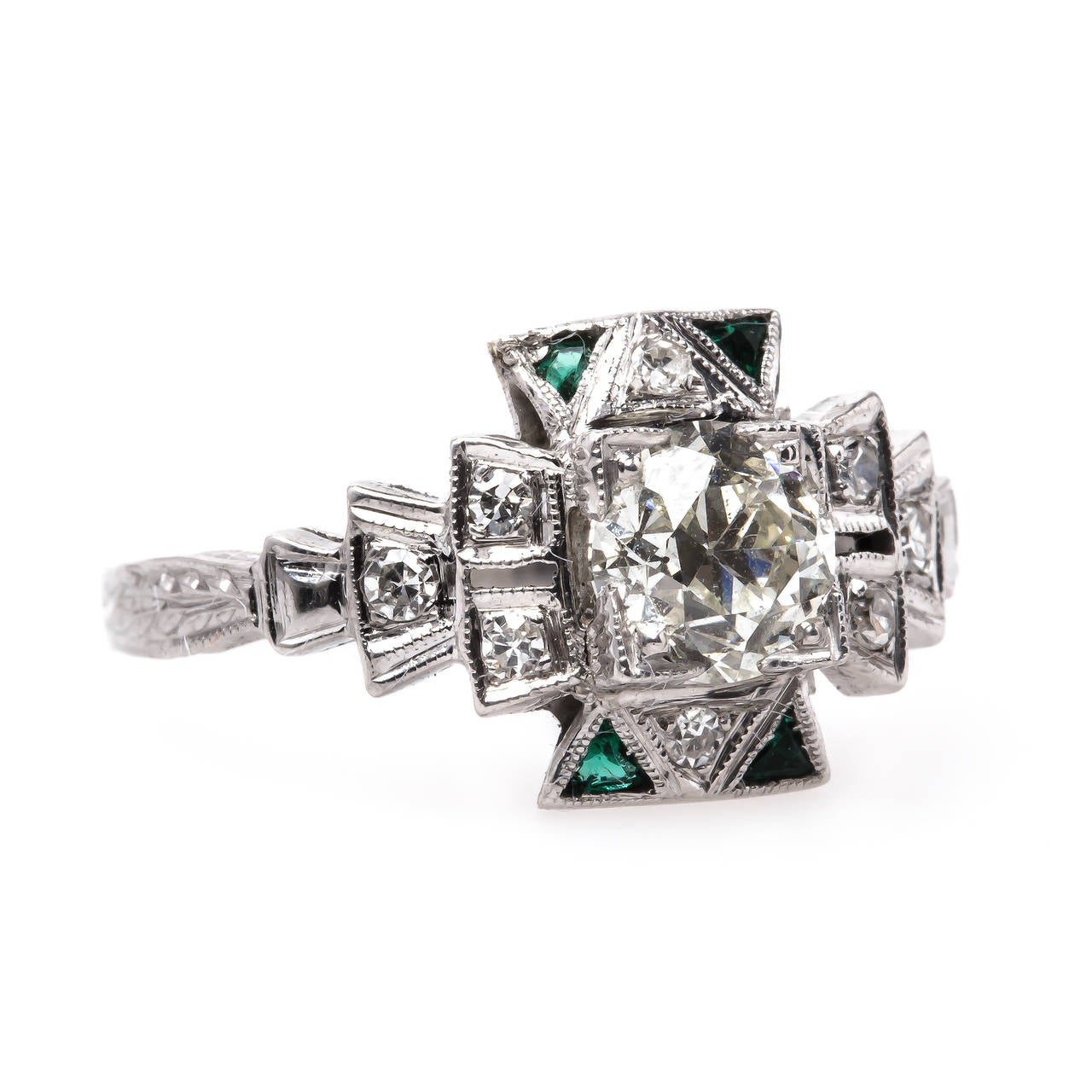 Alderley is a unique and unusual authentic  Late Art Deco (circa 1935) 18k white gold ring centering a box-set 0.88 carat EGL certified Old European cut diamond graded J color and VS2 clarity. Alderley is further designed by fan shaped steps