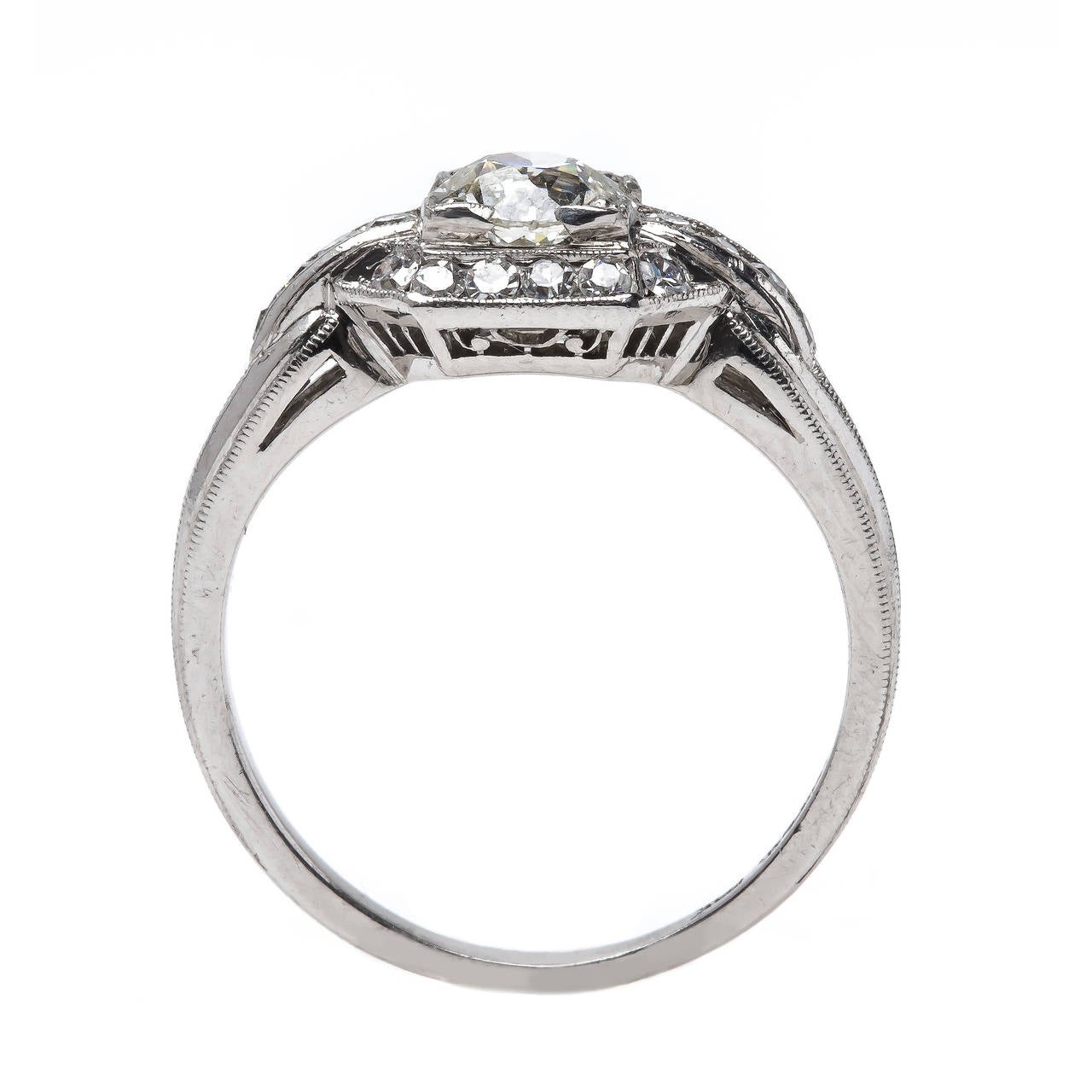 Women's Art Deco Era Platinum Ring with Old European Cut Diamond Center and Diamond Halo