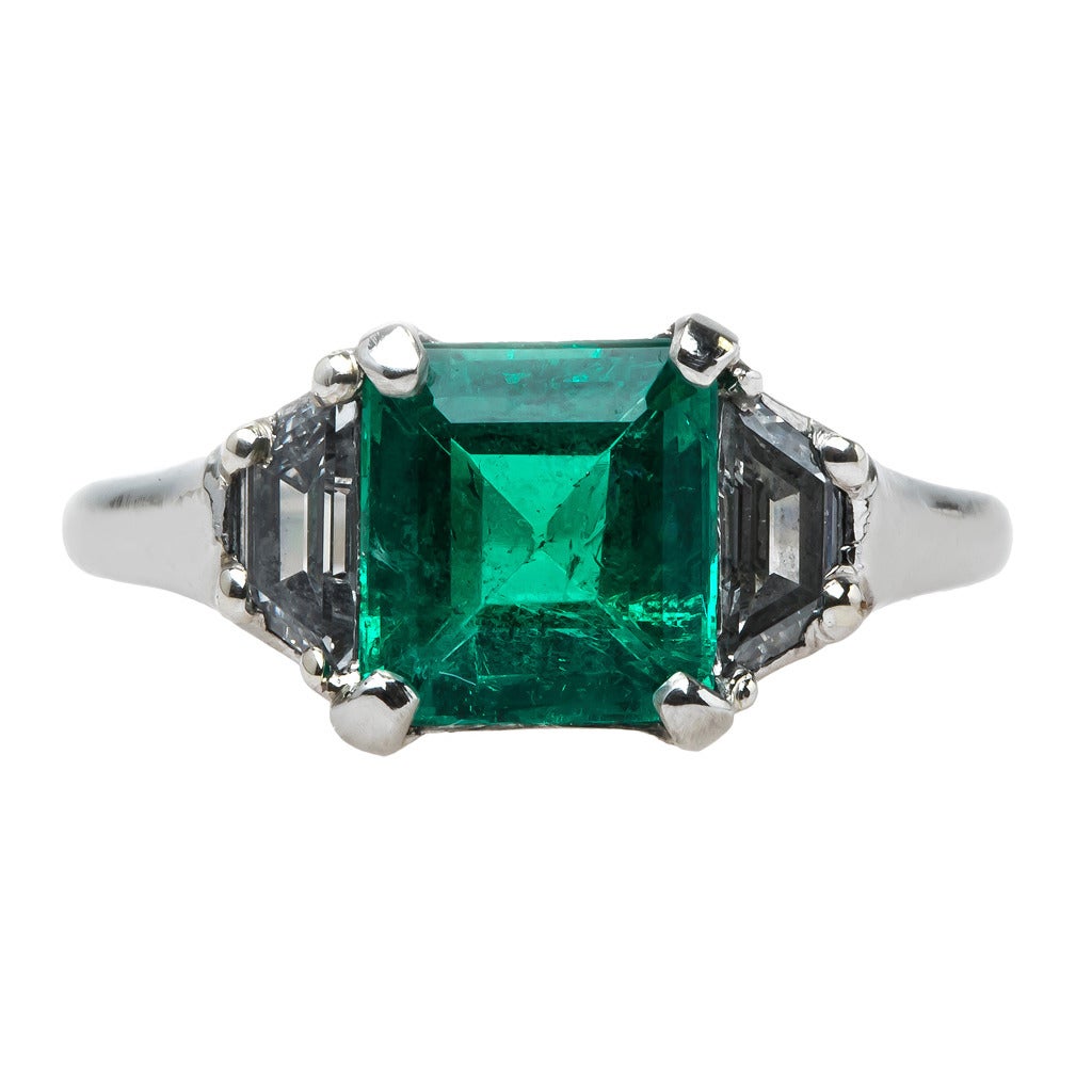 Chic Mid-Century Emerald Diamond Platinum Engagement Ring